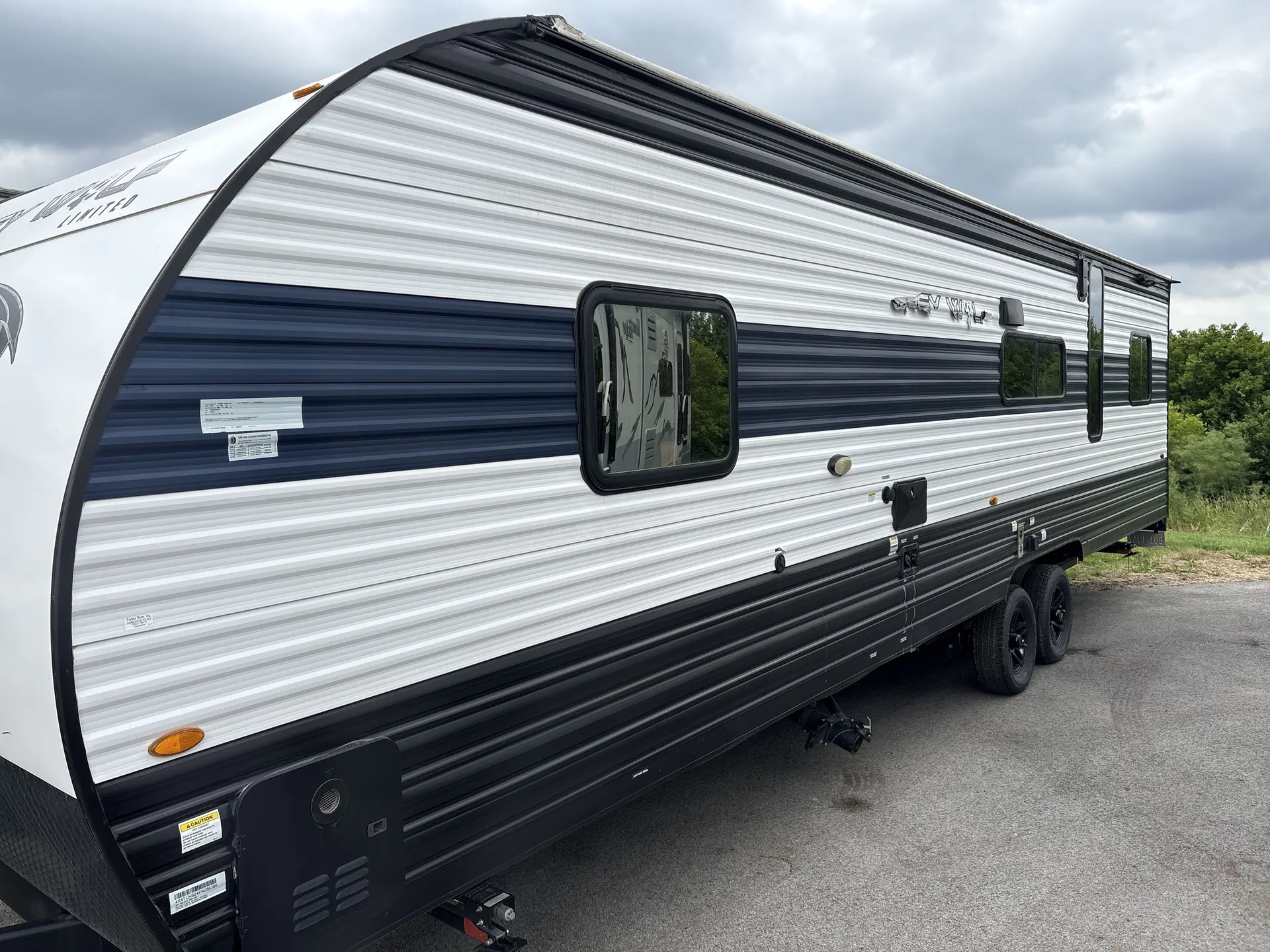 2023 Forest River Cherokee Grey Wolf 26MBRR — off campside