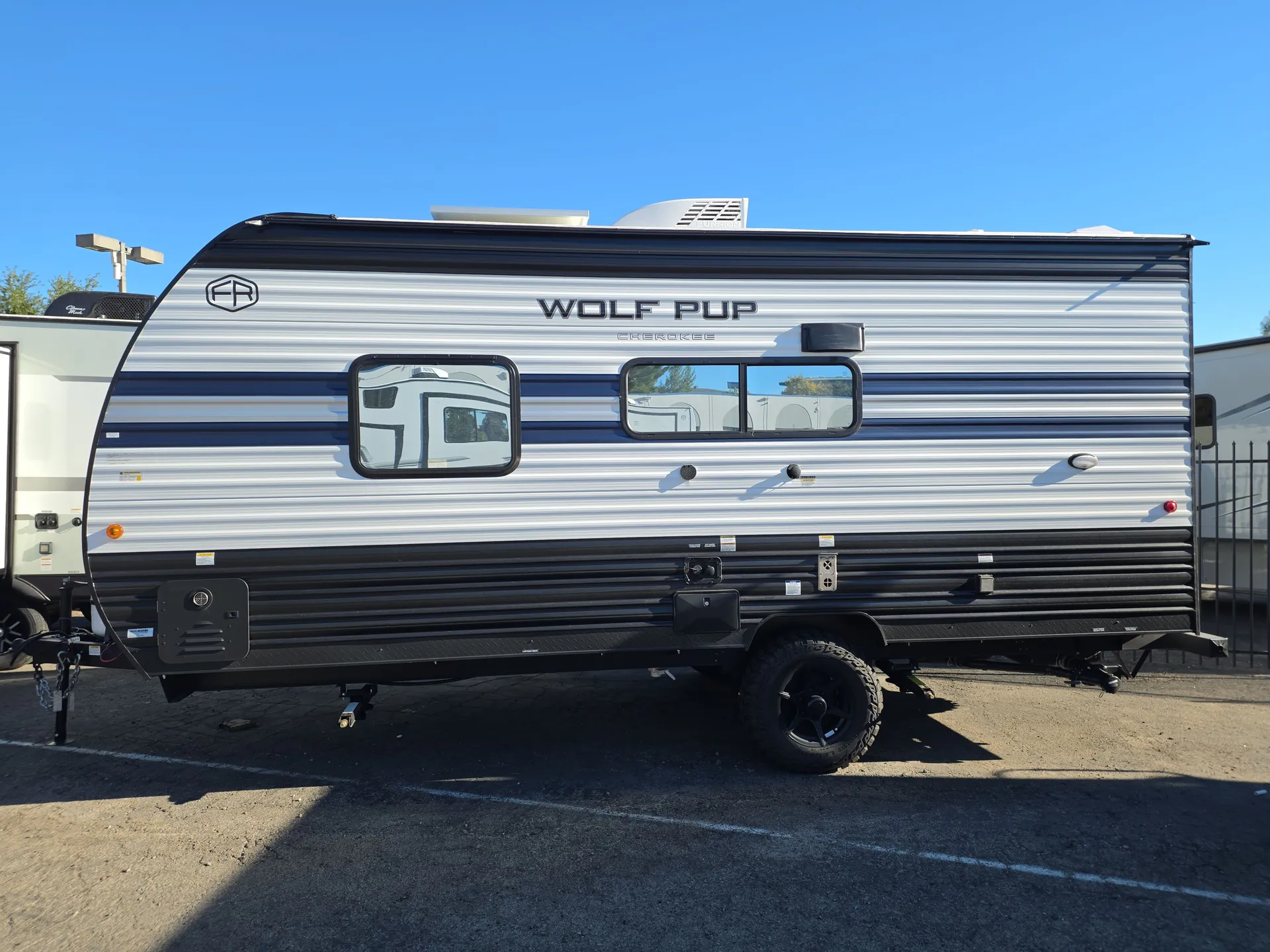 2027 Forest River Cherokee Wolf Pup 16FQW — off campside
