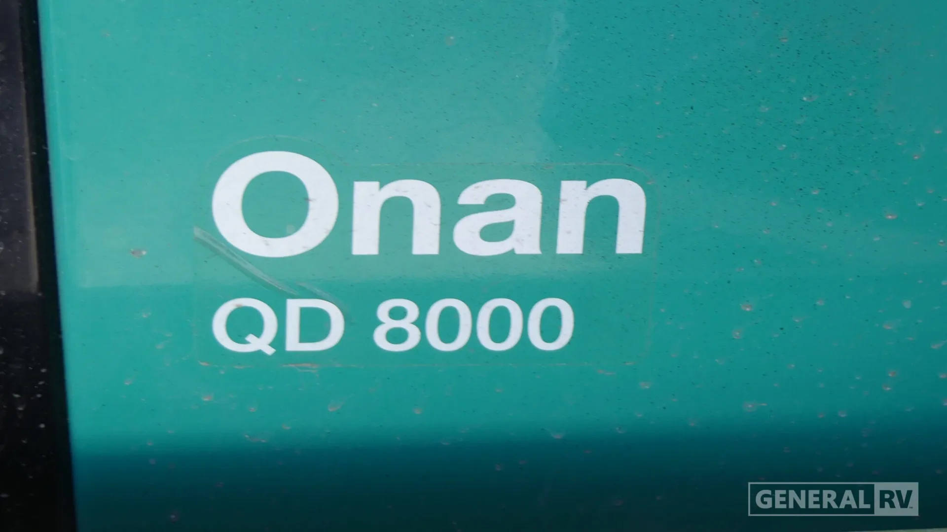 2026 Fleetwood Discovery LXE 40G — Close-up visibly shows the Onan QD 8000 generator, an RV mechanical system