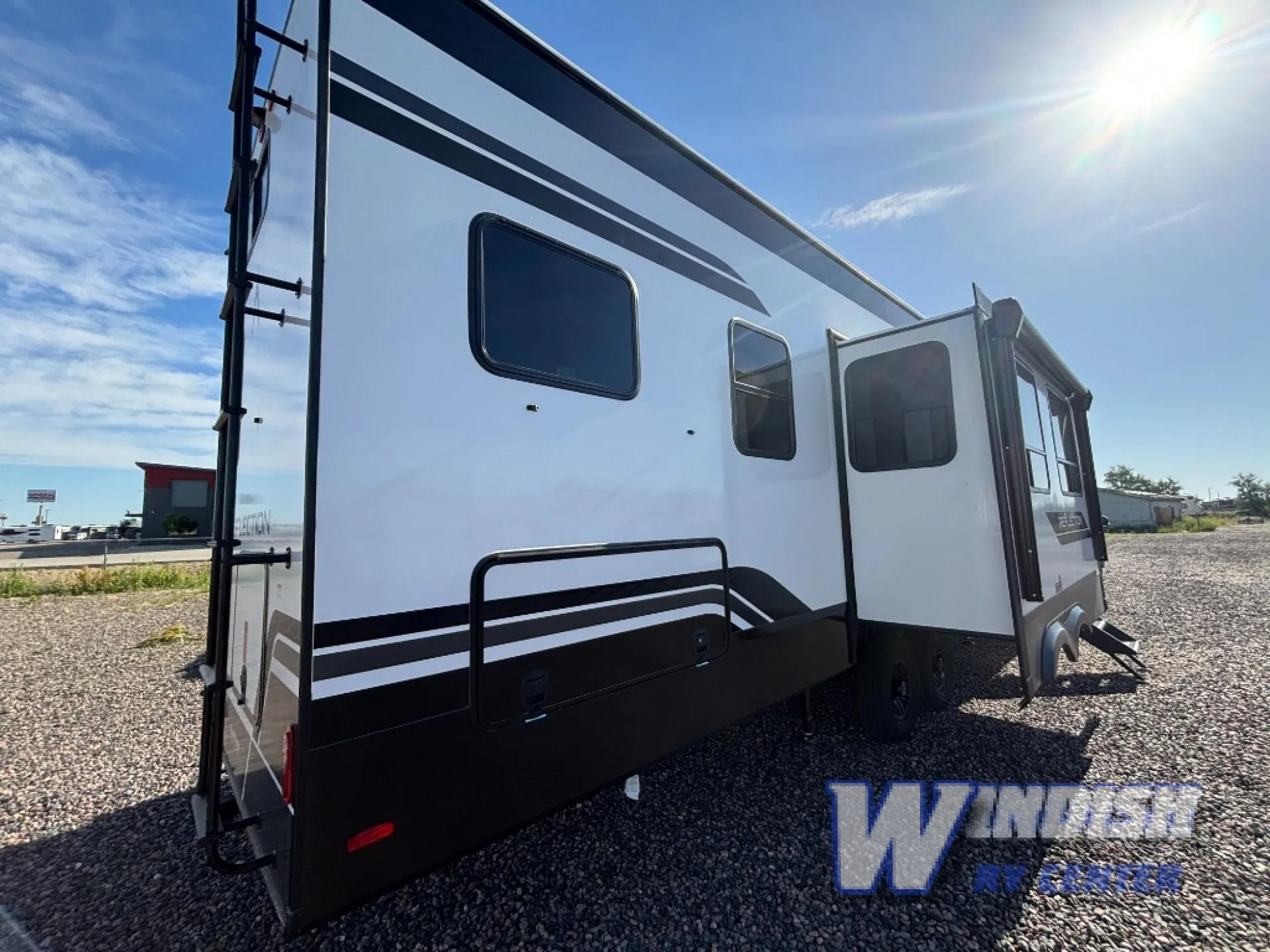 2027 Grand Design Reflection 362TBS — Rear and side exterior of the RV are visible, including the rear ladder, body shell, windows, and slide-out