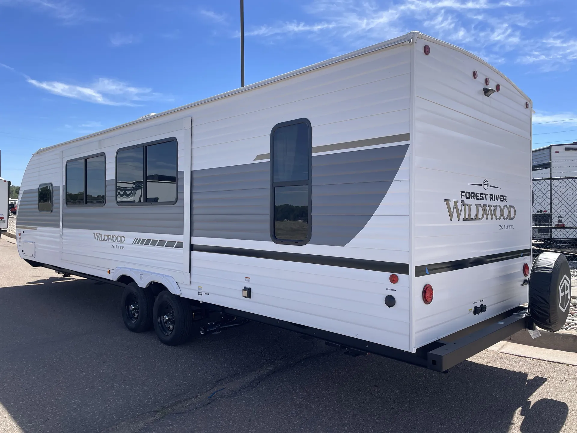 2027 Forest River Wildwood X-Lite 273QBXL — campside