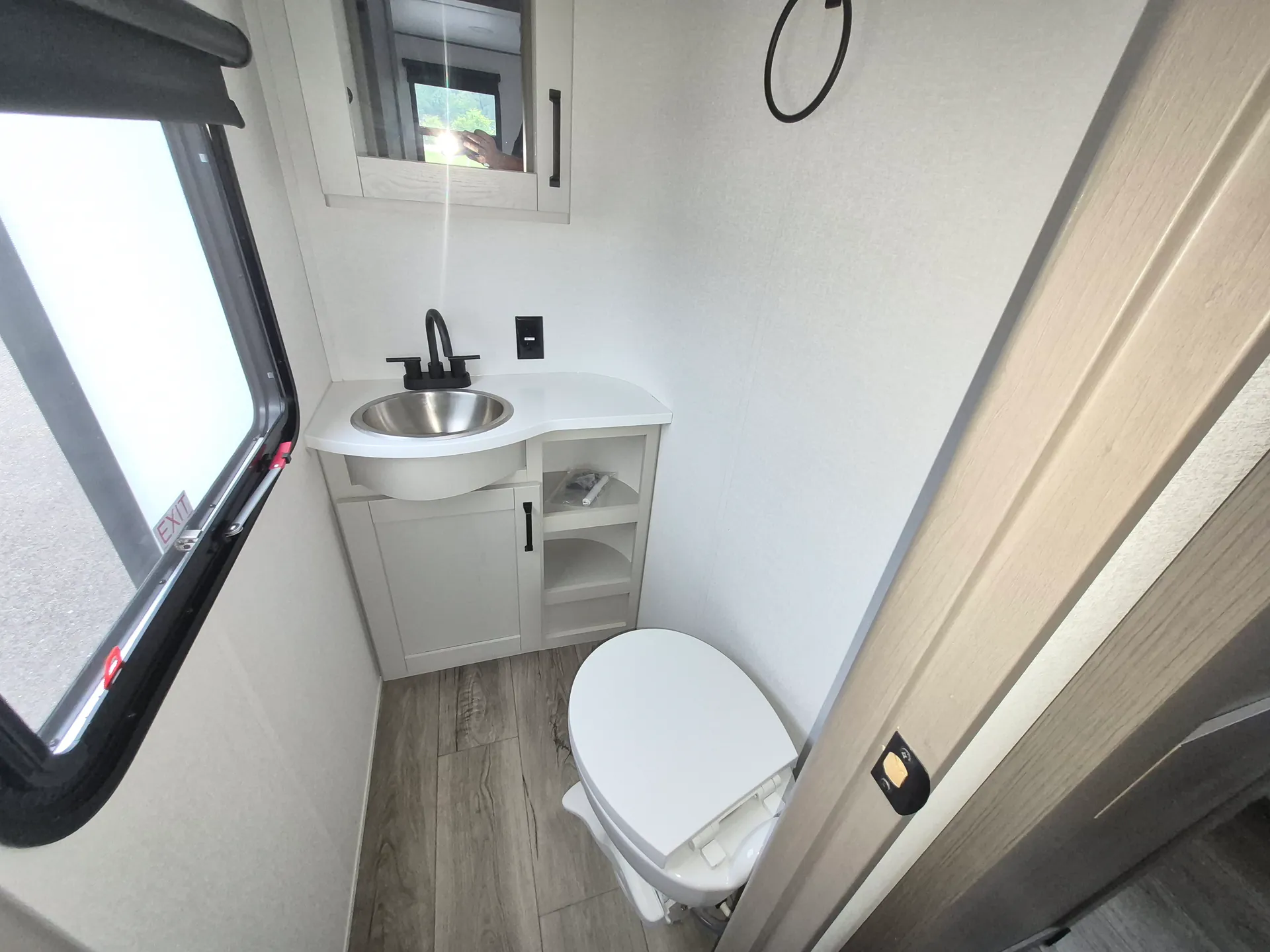 2027 Grand Design Reflection 362TBS — Bathroom with toilet, round sink, vanity cabinet, open shelving, window, and mirrored medicine cabinet
