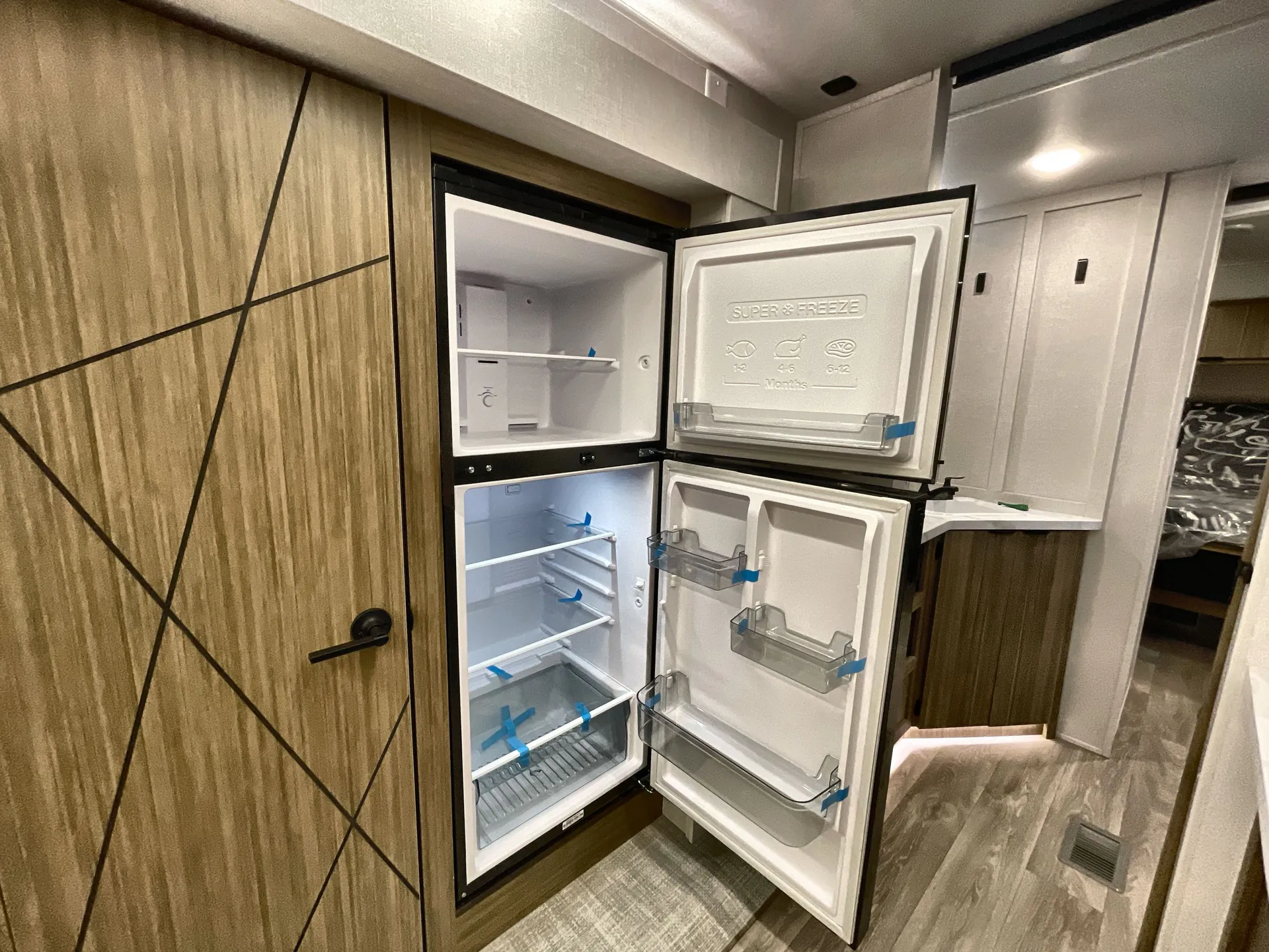 2026 Forest River Wildwood 300ICE — fridge open