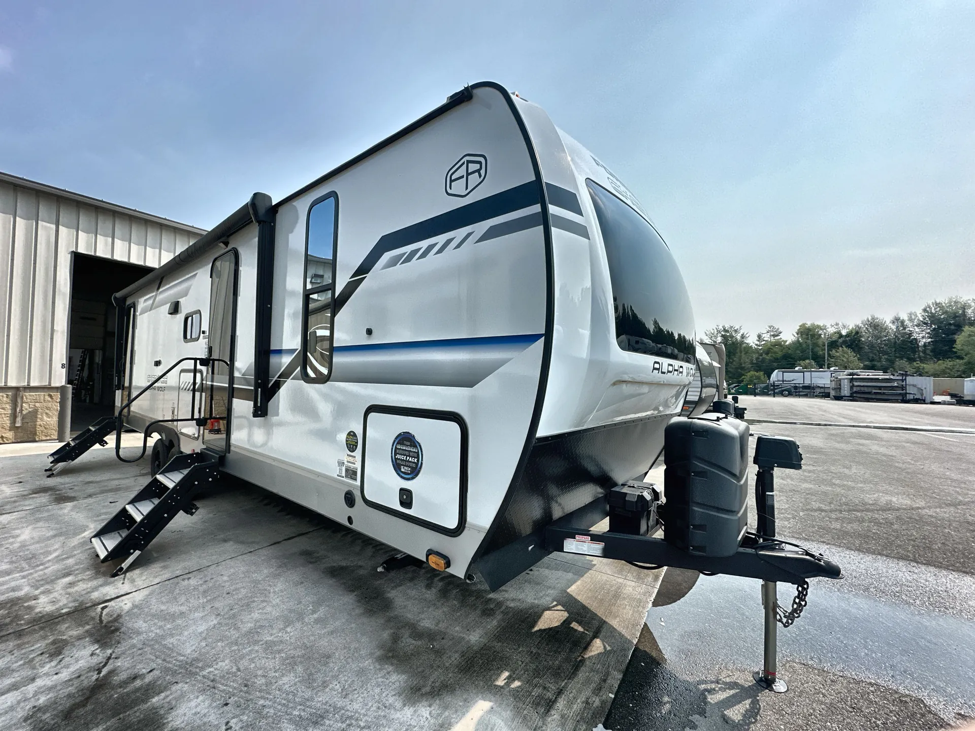 2025 Forest River Alpha Wolf 26DBH dealer photo 1 from Camping World