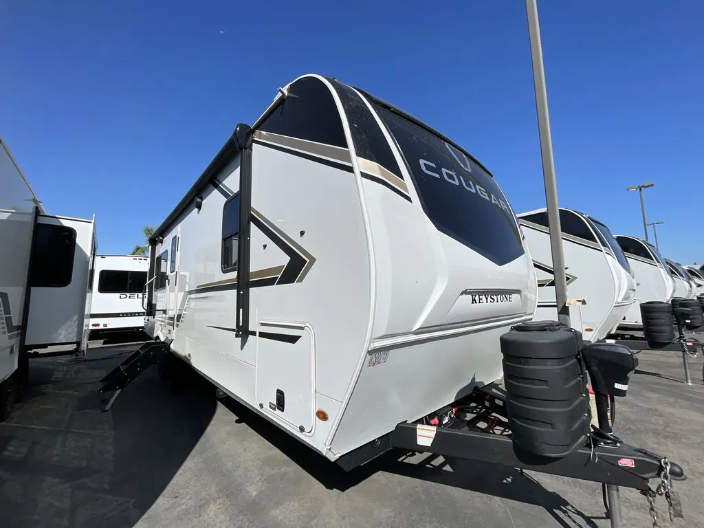 2027 Keystone Cougar Western Elevation 25MLWE dealer photo 1 from Blue Compass RV
