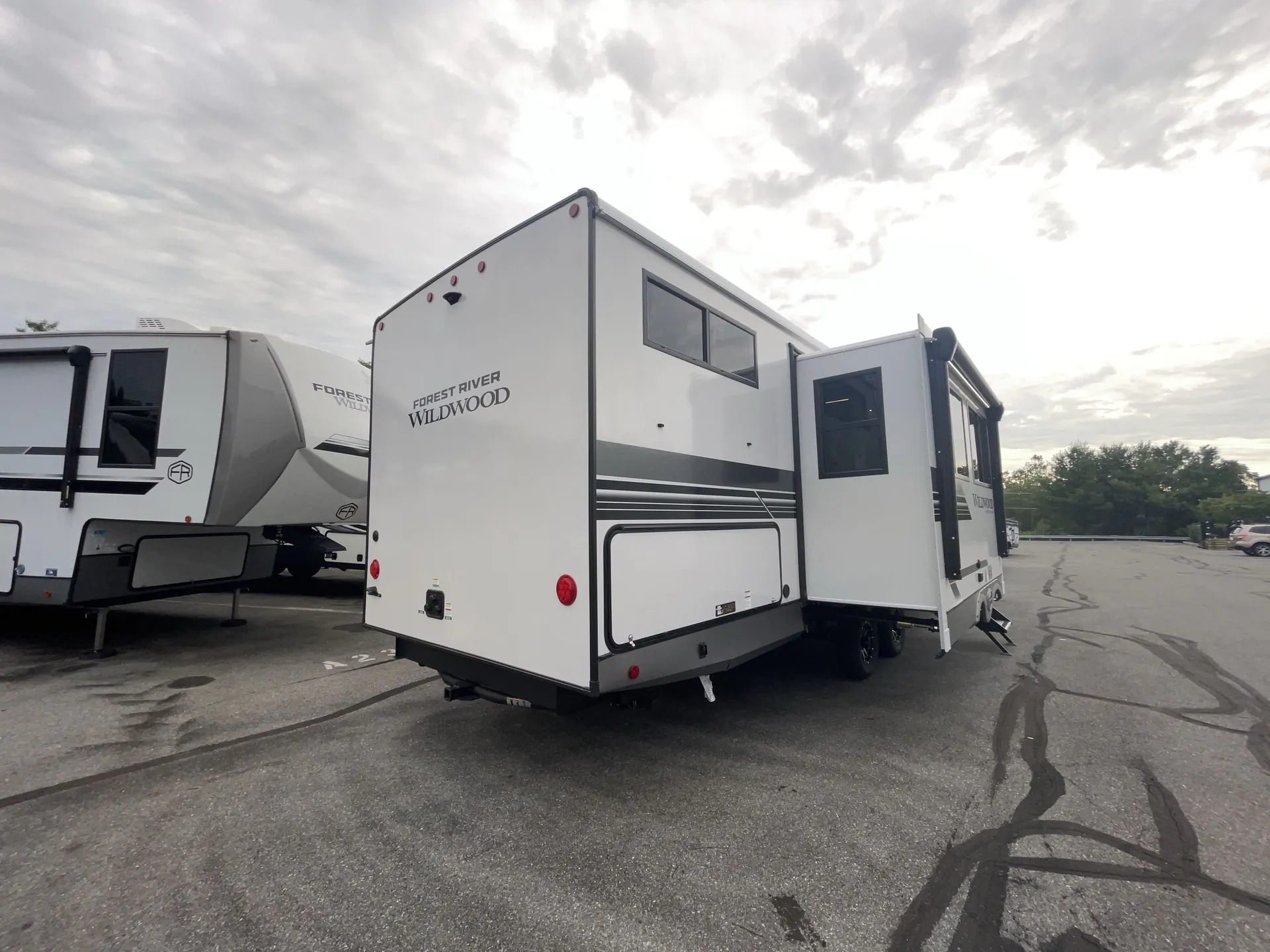 2027 Forest River Wildwood Heritage Glen 301FAM — campside