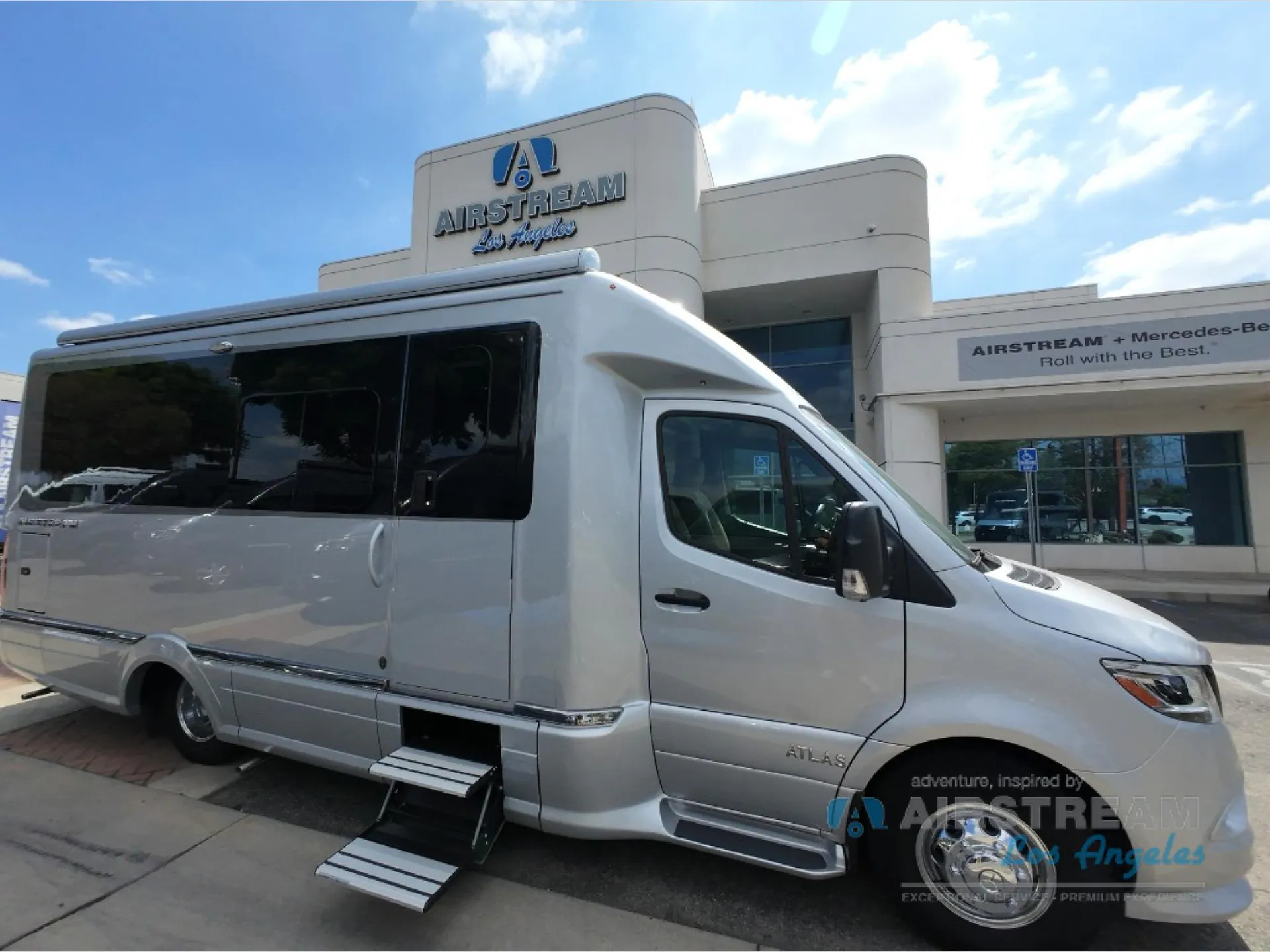2026 Airstream Atlas Murphy Suite — Photograph clearly shows the exterior side and front of the Airstream Atlas motorhome