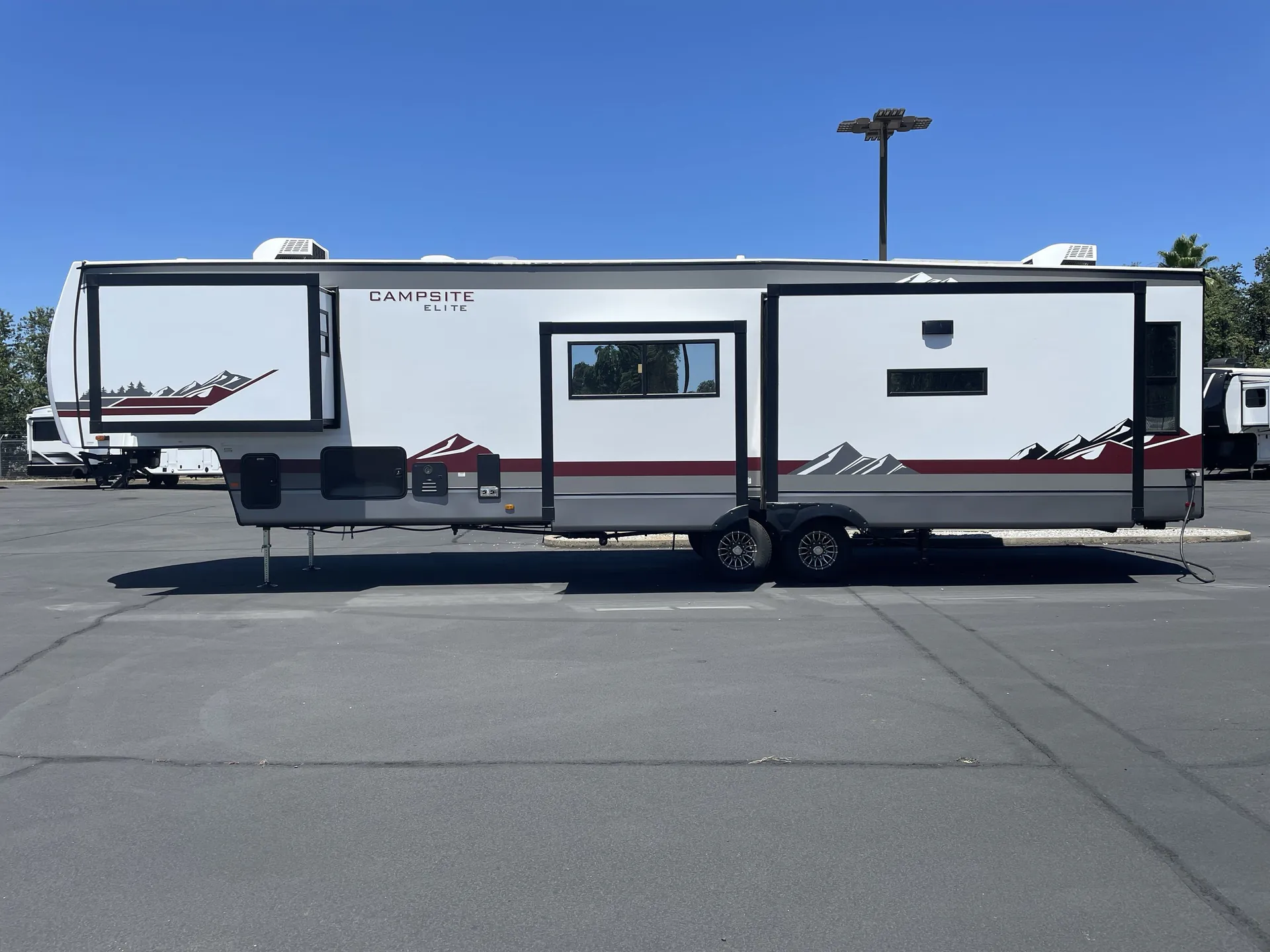 2027 Forest River Campsite Elite 36RF — off campside