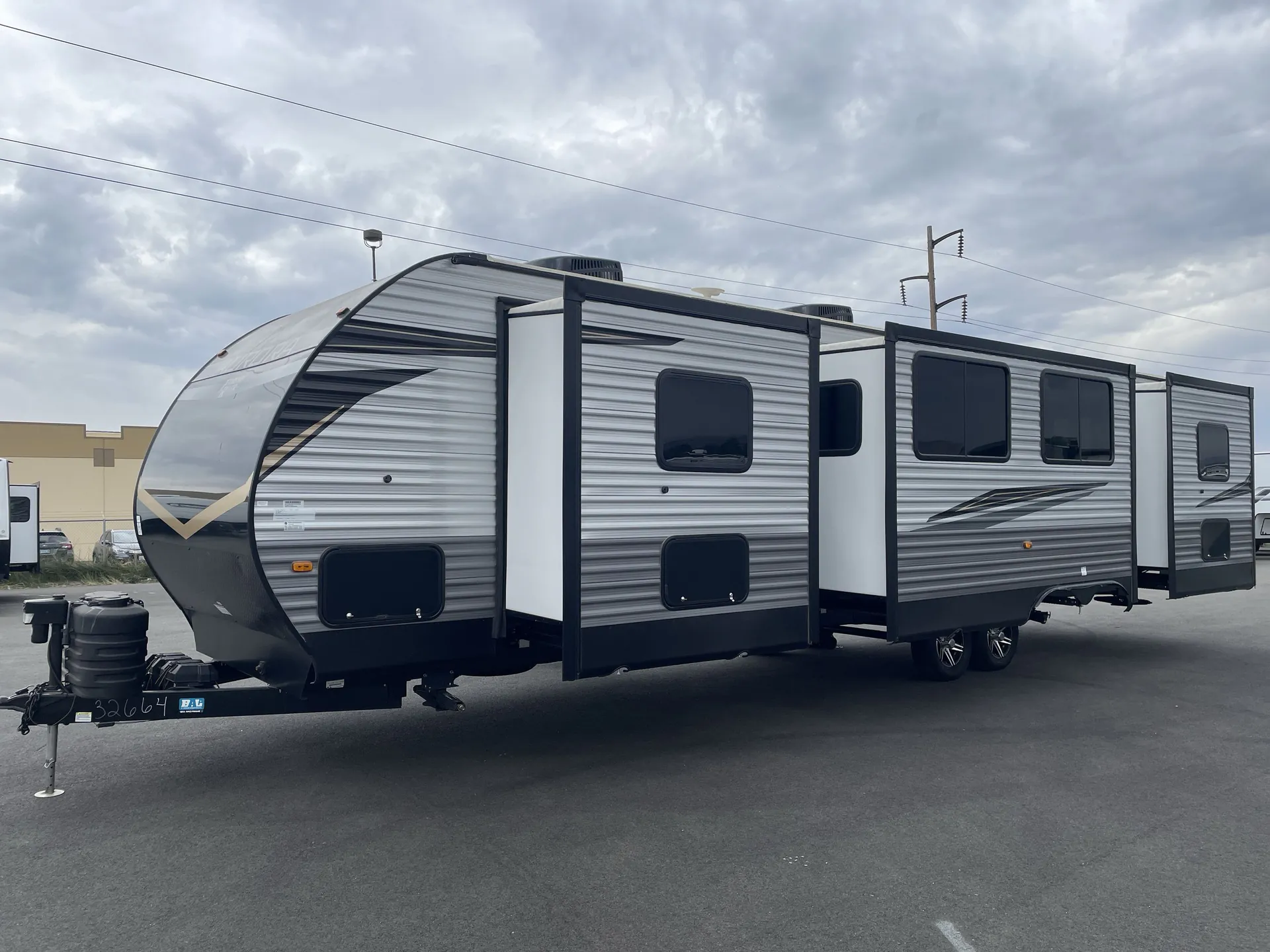 2025 Forest River Aurora 34BHTS — off campside