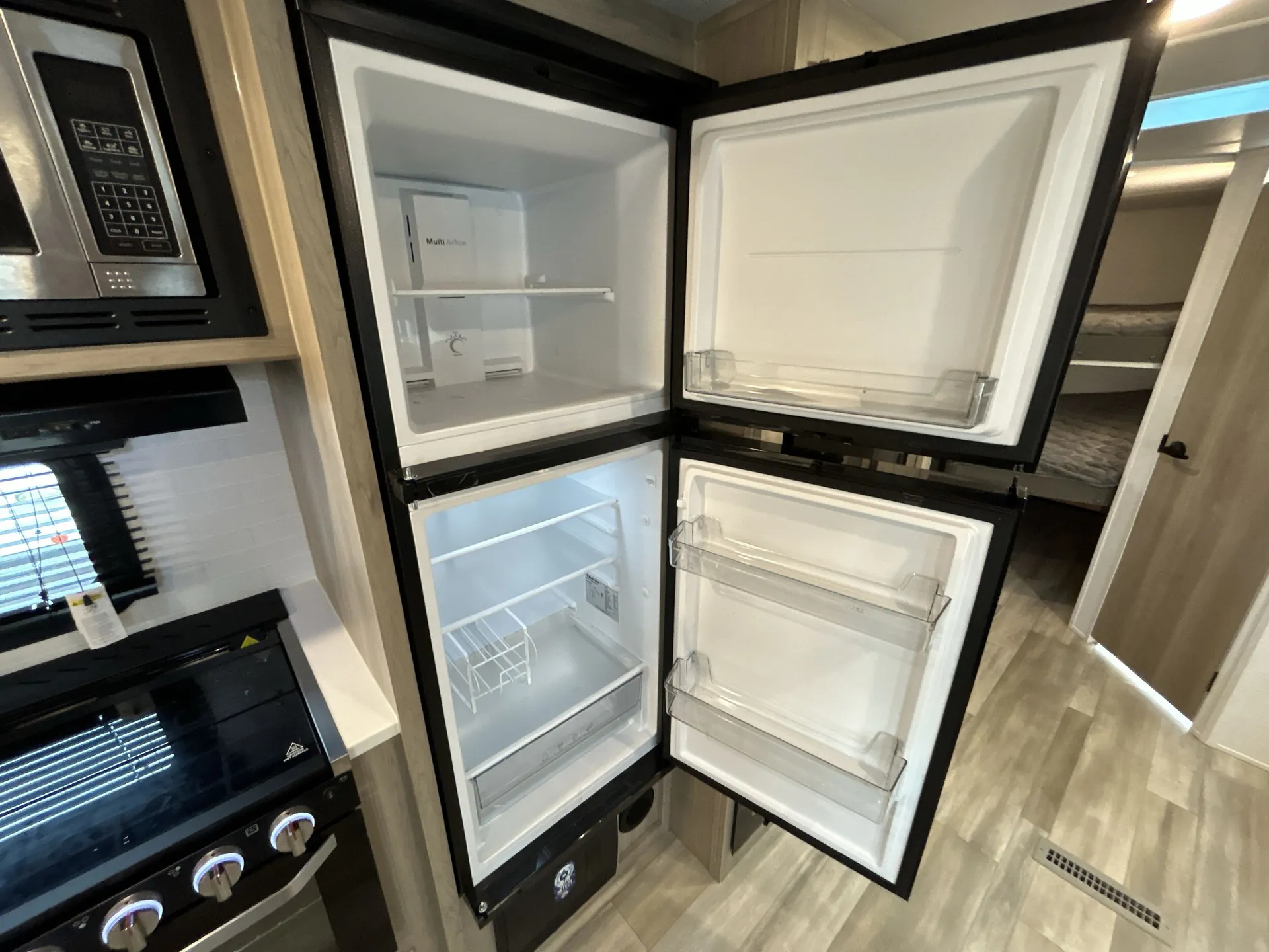 2024 Forest River Flagstaff Super Lite 27BHWS — fridge open