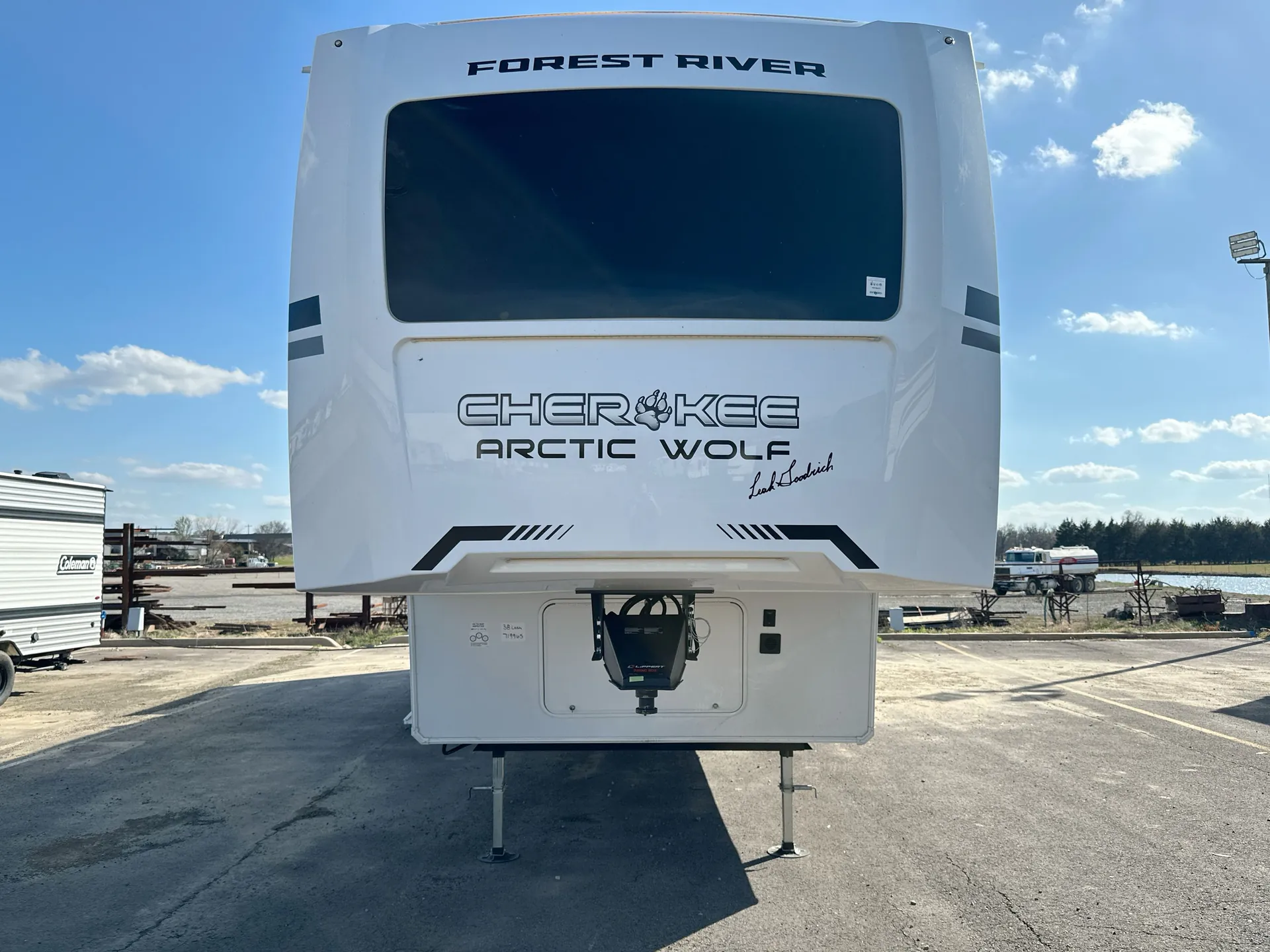 2026 Forest River Arctic Wolf 38LEAH.G — Front exterior photograph visibly shows the fifth-wheel nose, branding, front window, landing legs, and hitch area