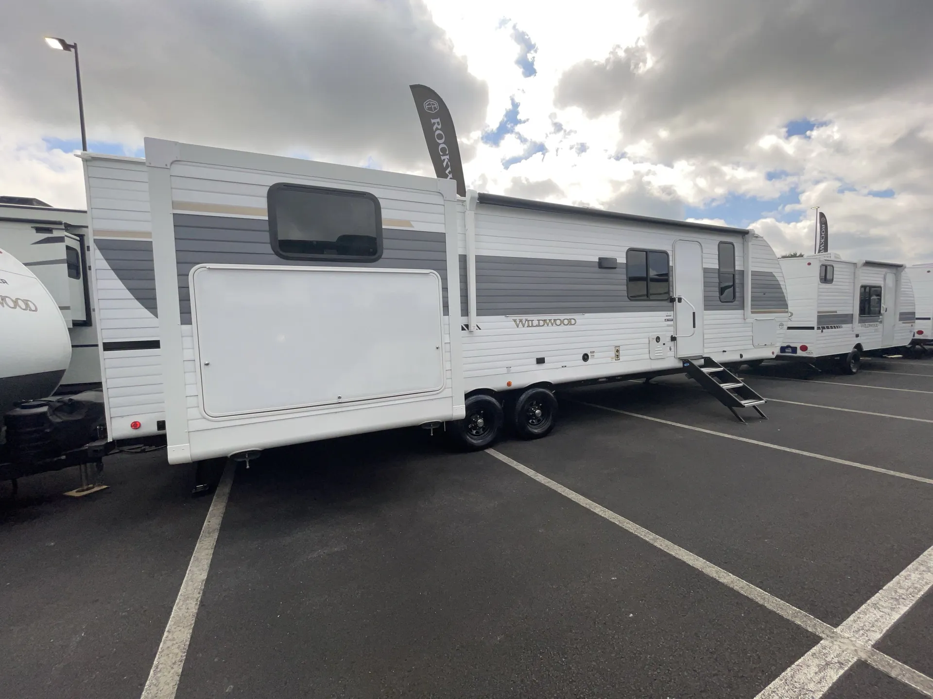 2027 Forest River Wildwood 31KQBTS — campside