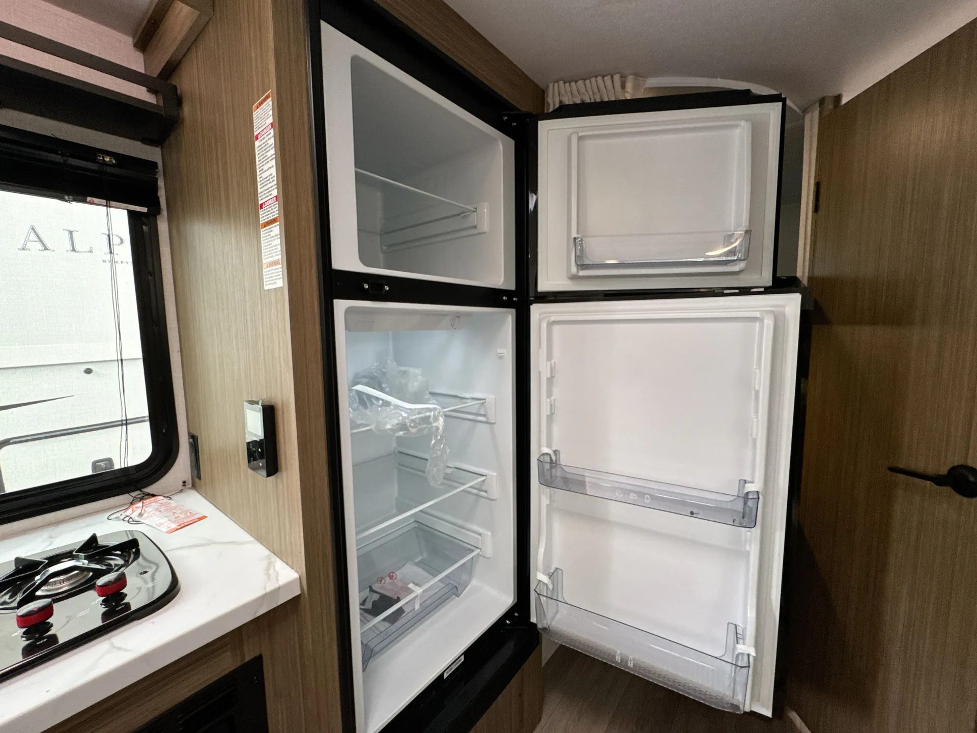 2026 Forest River Wildwood Fsx 178ICE — fridge open