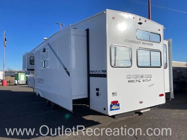 2026 Forest River Arctic Wolf 38LEAH.G — The rear and side exterior of the RV, including rear lights, windows, and slide-outs