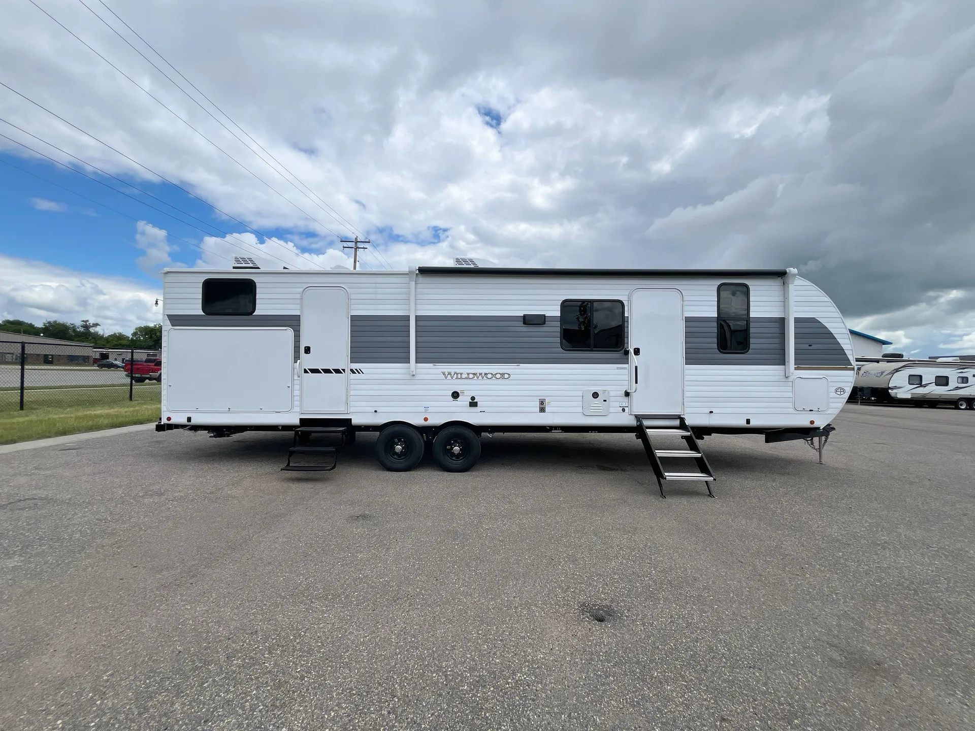 2027 Forest River Wildwood 32BHDS — campside