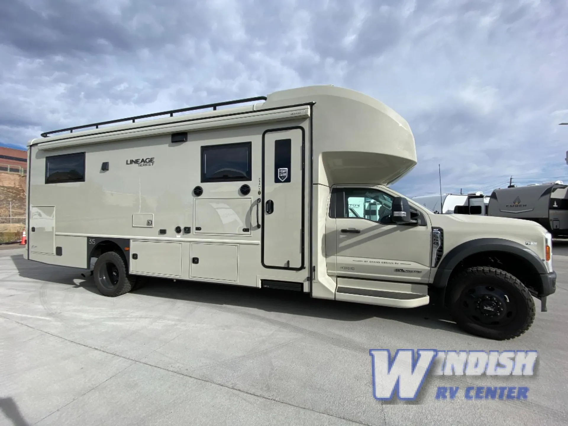 2027 Grand Design Lineage Series F 29AN5 — The complete motorhome exterior, including its shell, cab, wheels, door, windows, and exterior compartments