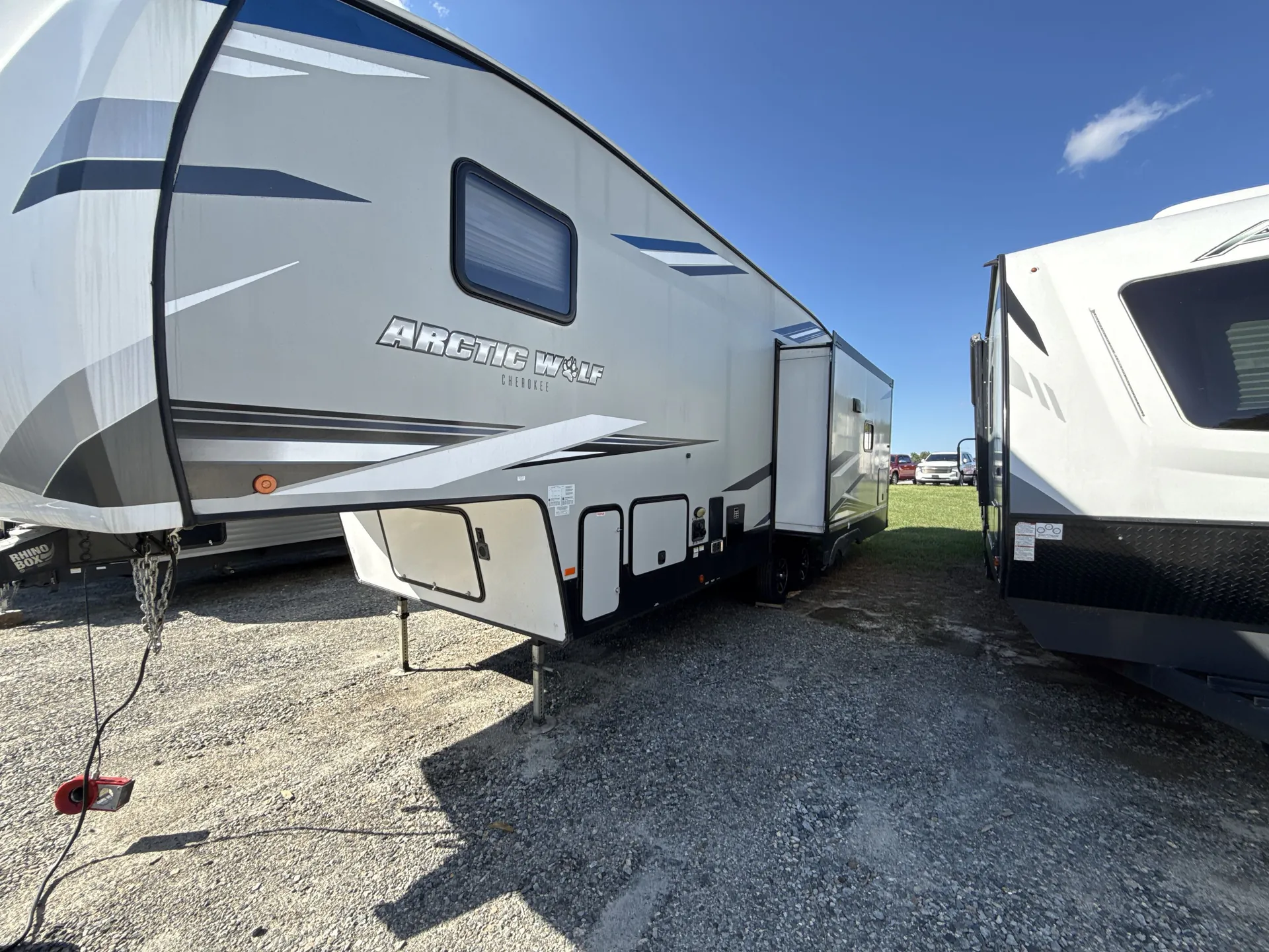2022 Forest River Cherokee Arctic Wolf 291RL — off campside