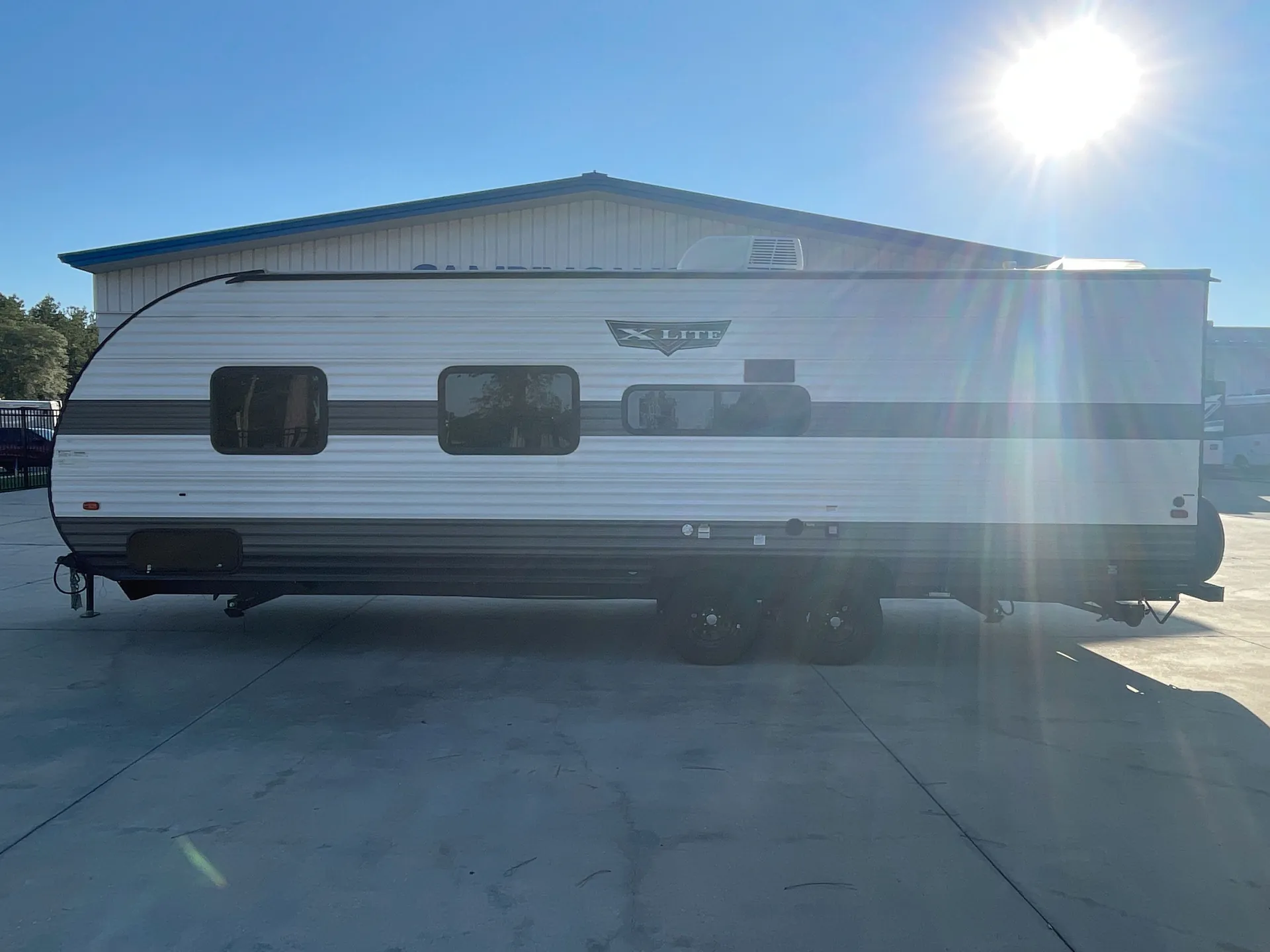 2023 Forest River Wildwood X-Lite 261BHXL — off campside