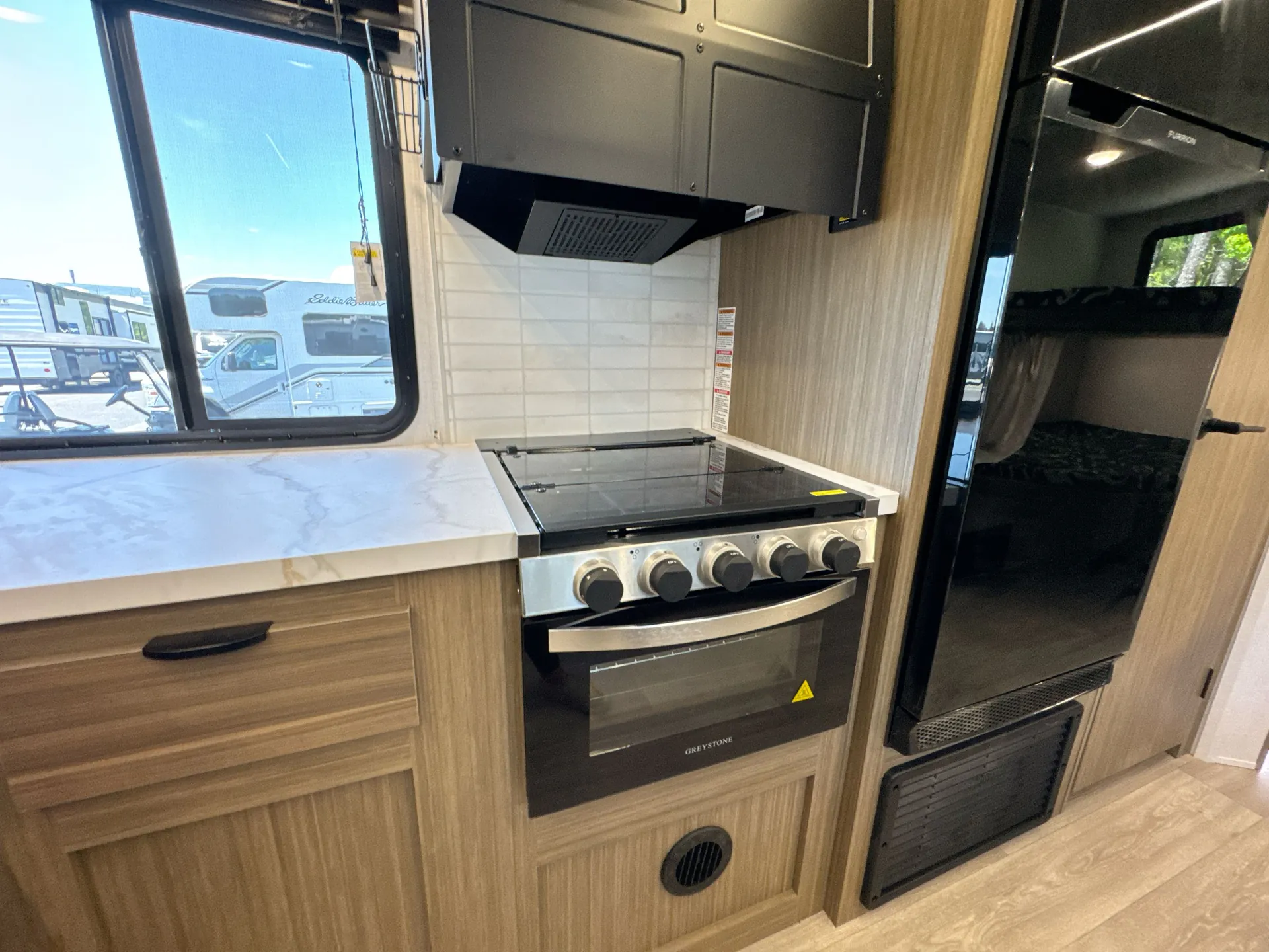 2026 Forest River Wildwood X-Lite 263BHXL — stove oven