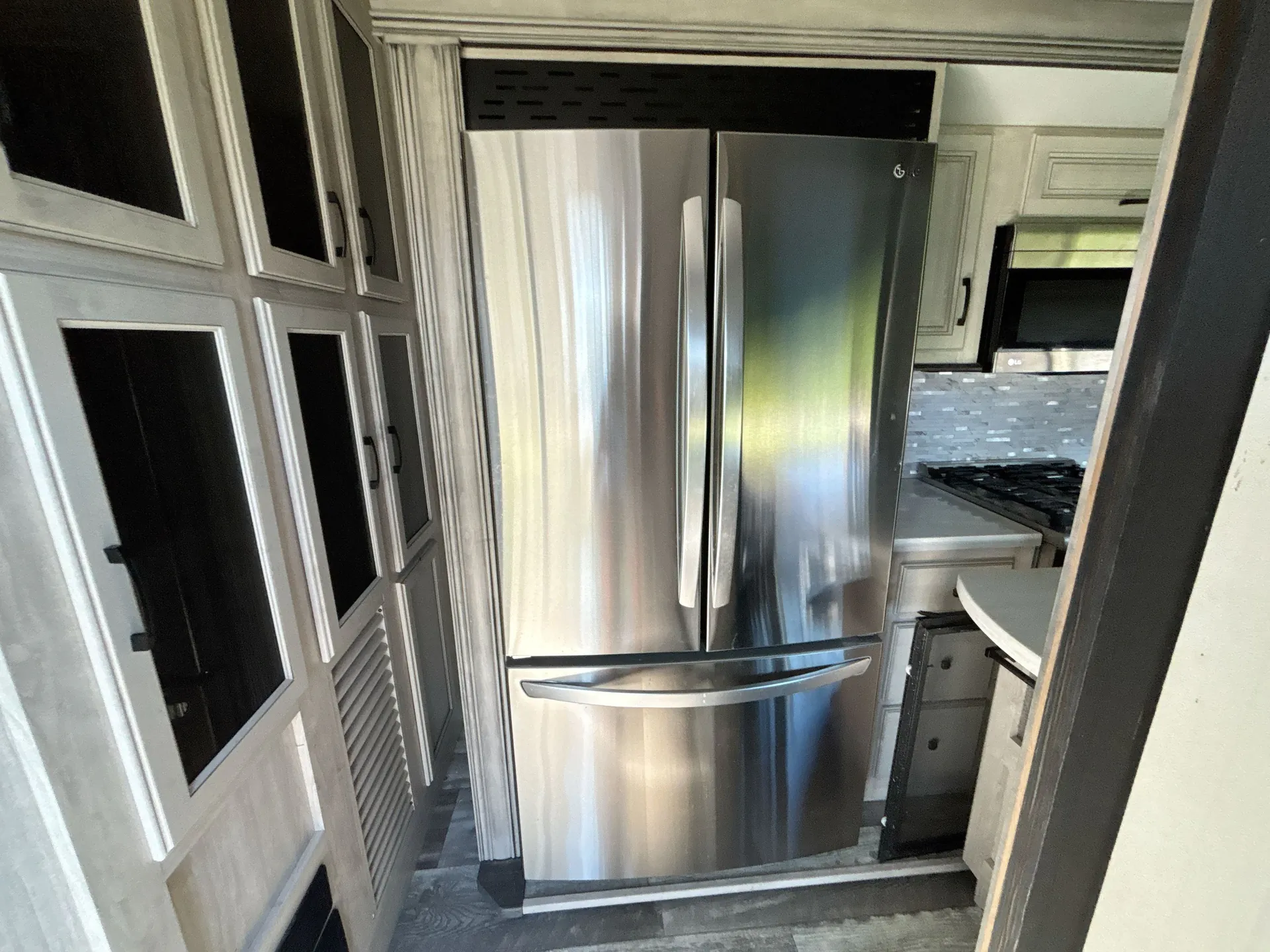 2022 Forest River Sandpiper Destination 401FLX — fridge open