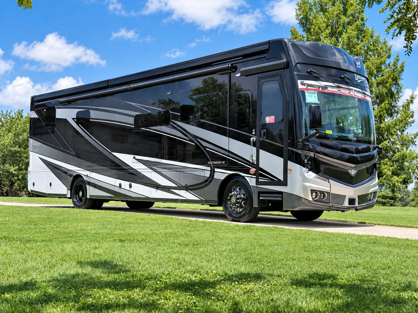 2027 Fleetwood Discovery LXE 40M — The complete exterior front and side of the motorhome