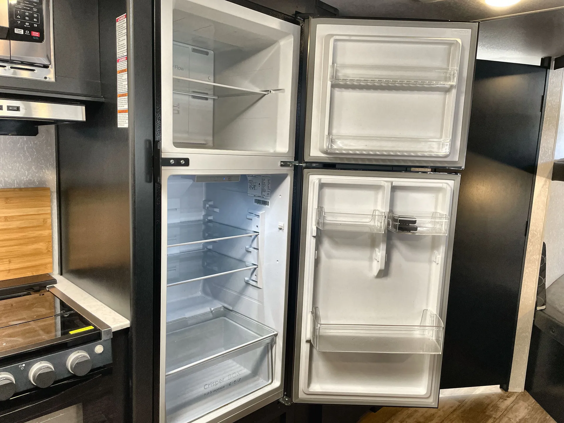 2022 Forest River Cherokee Grey Wolf 26DBH — fridge open