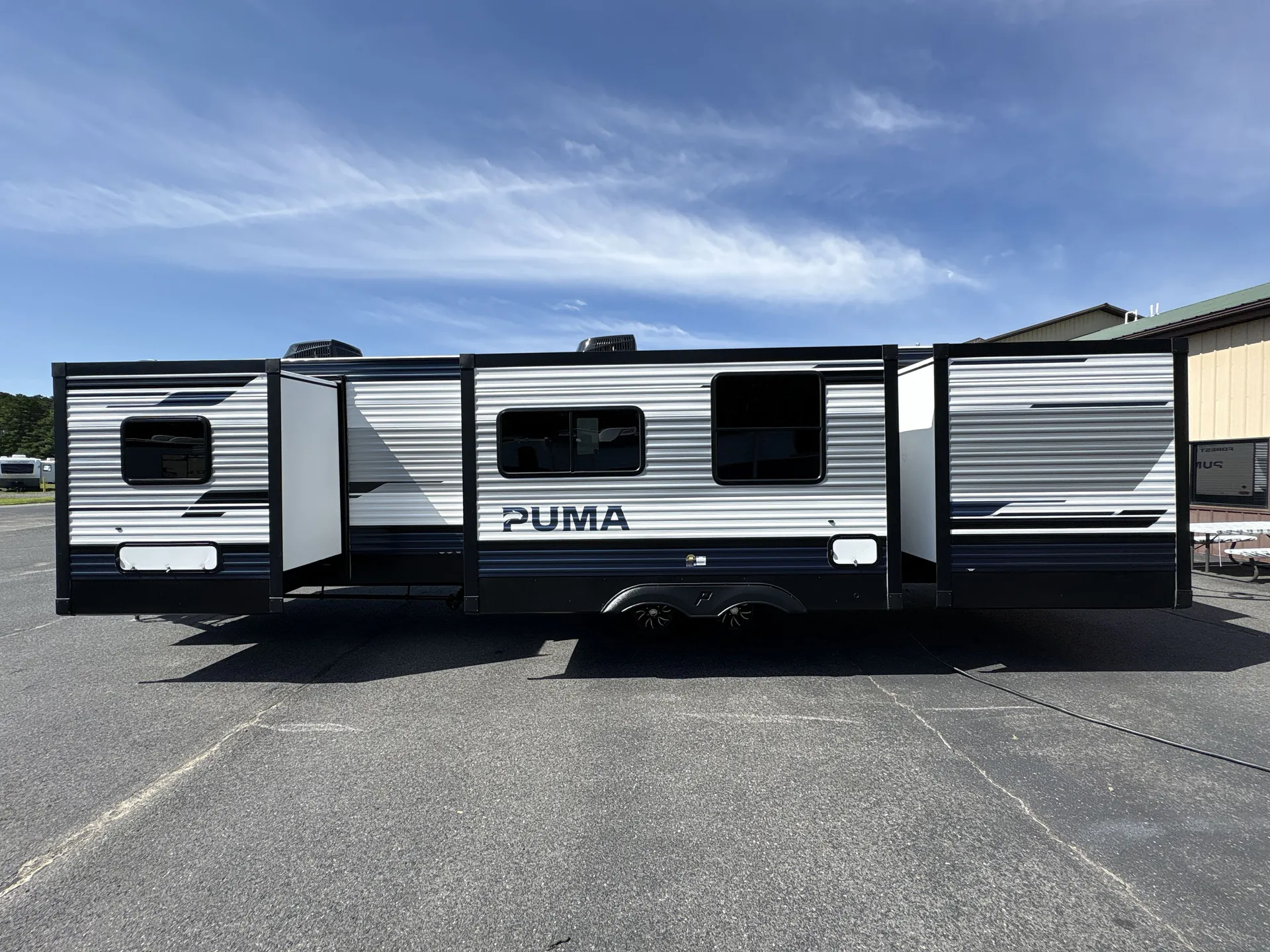 2027 Forest River Puma 32BHFS — off campside