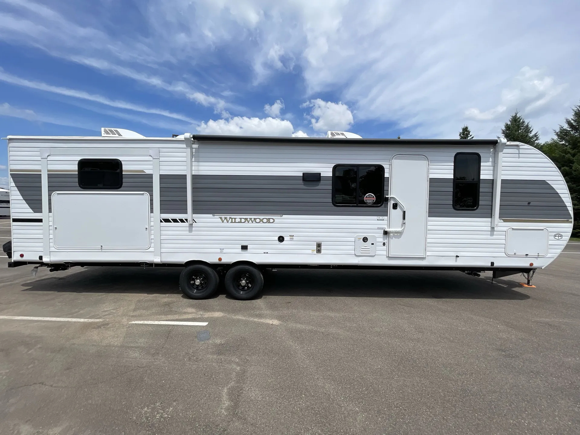 2027 Forest River Wildwood 31KQBTS — campside