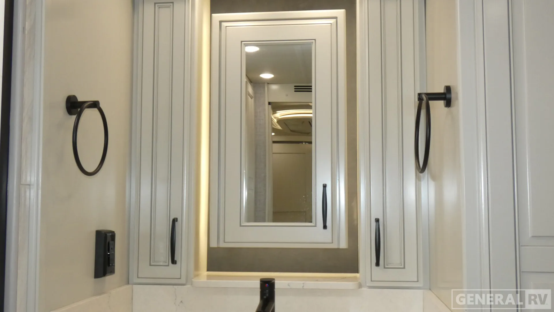 2026 American Coach American Dream 45A — Bathroom vanity with vessel sink, mirrored medicine cabinet, surrounding storage, and towel rings