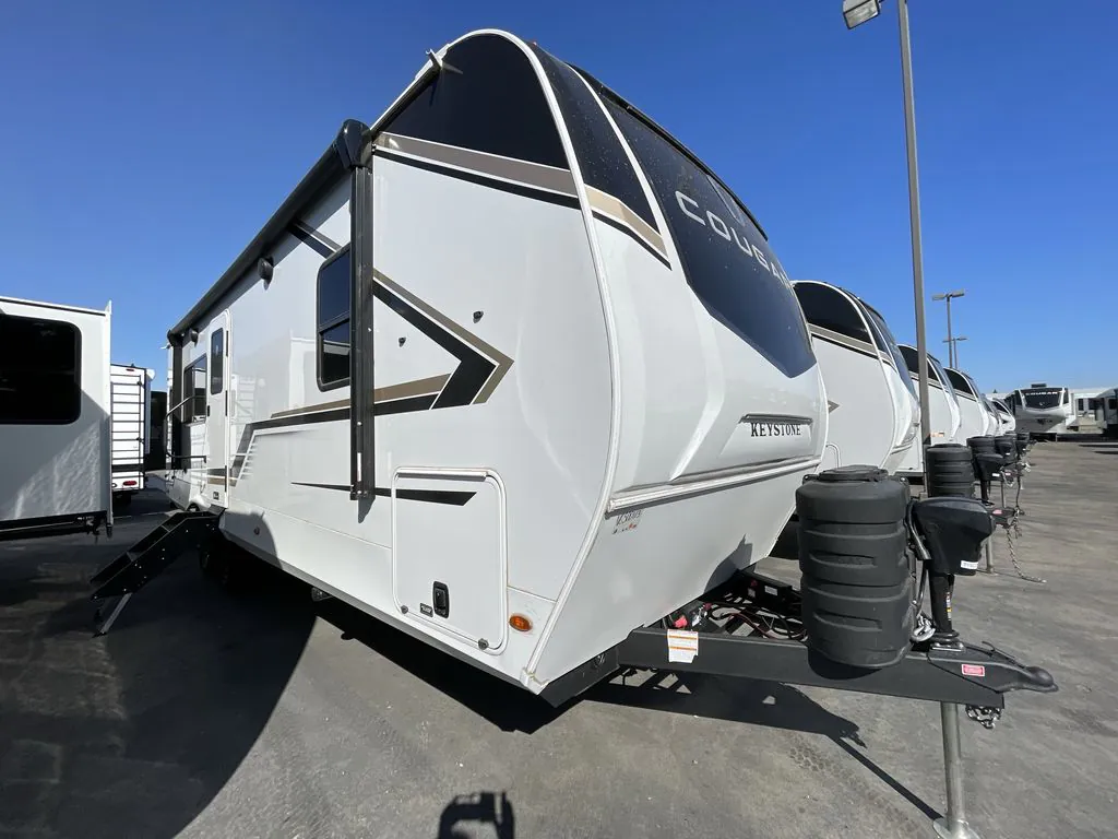 2027 Keystone Cougar Western Elevation 25MLWE dealer photo 1 from Blue Compass RV