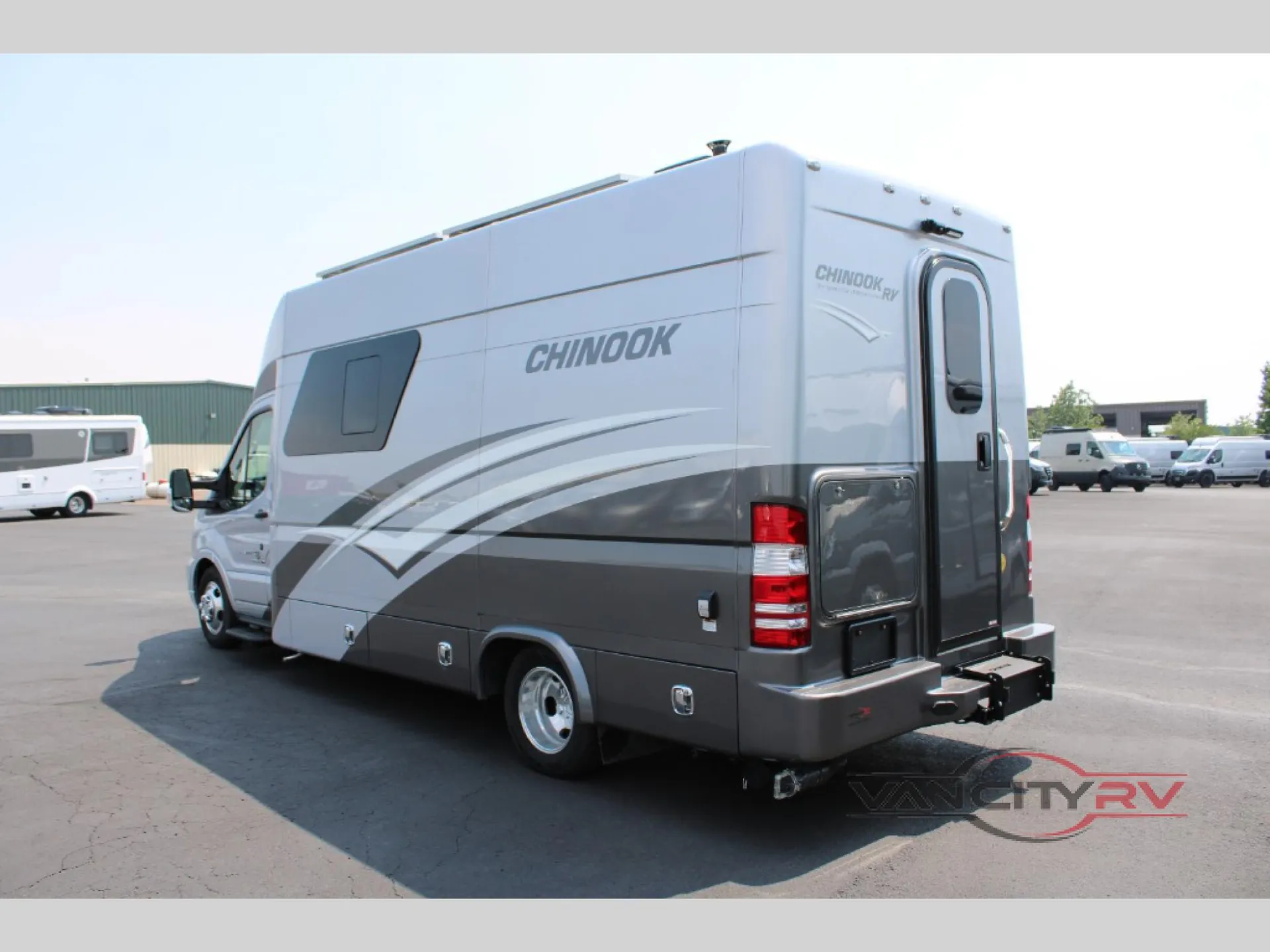 2025 Chinook RV Maverick SS — Rear three-quarter photograph clearly shows the motorhome's exterior shell, rear door, bumper, lights, and side compartments