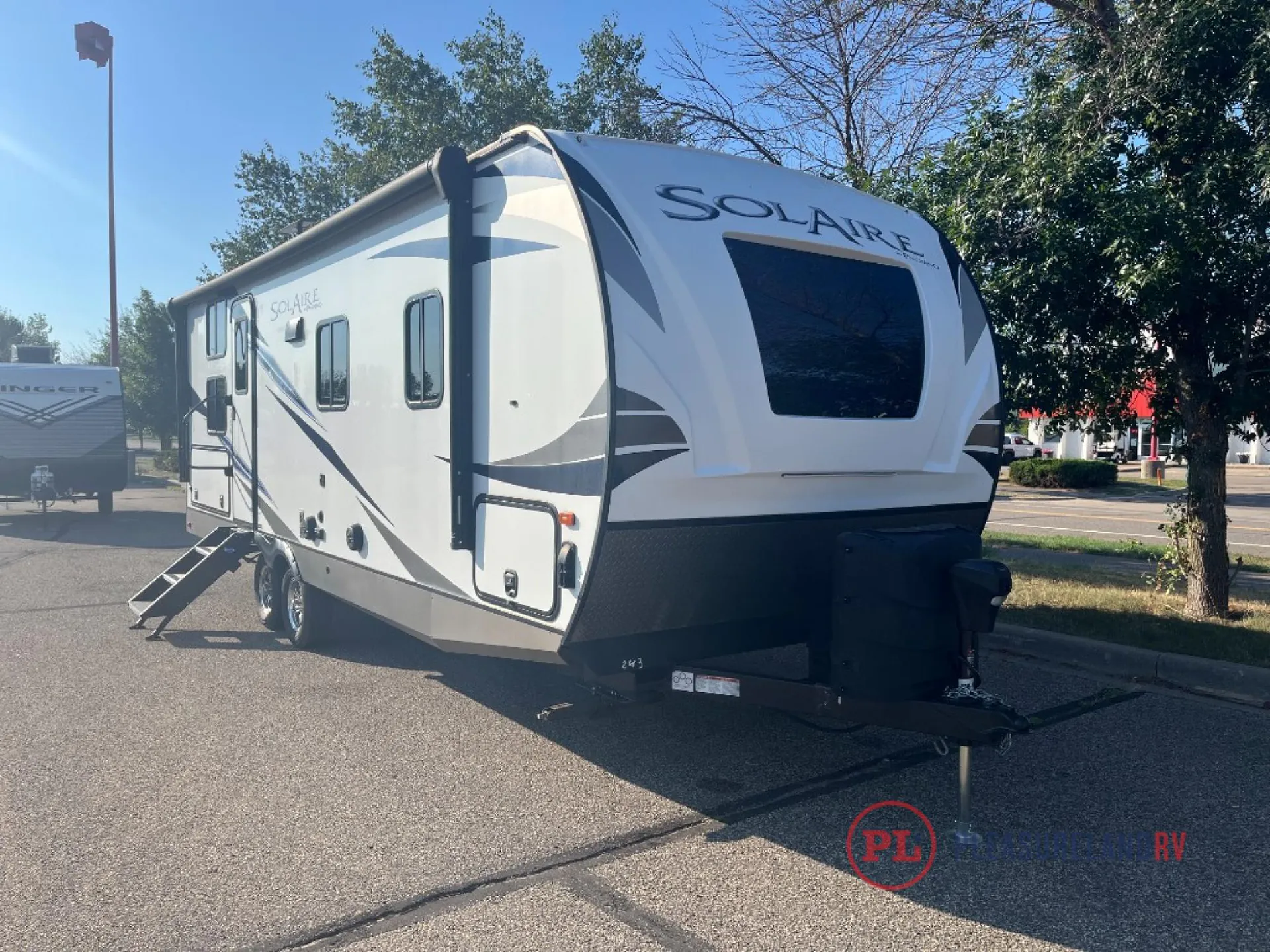 2021 Palomino Solaire 243BHS dealer photo 1 from Pleasureland RV Center