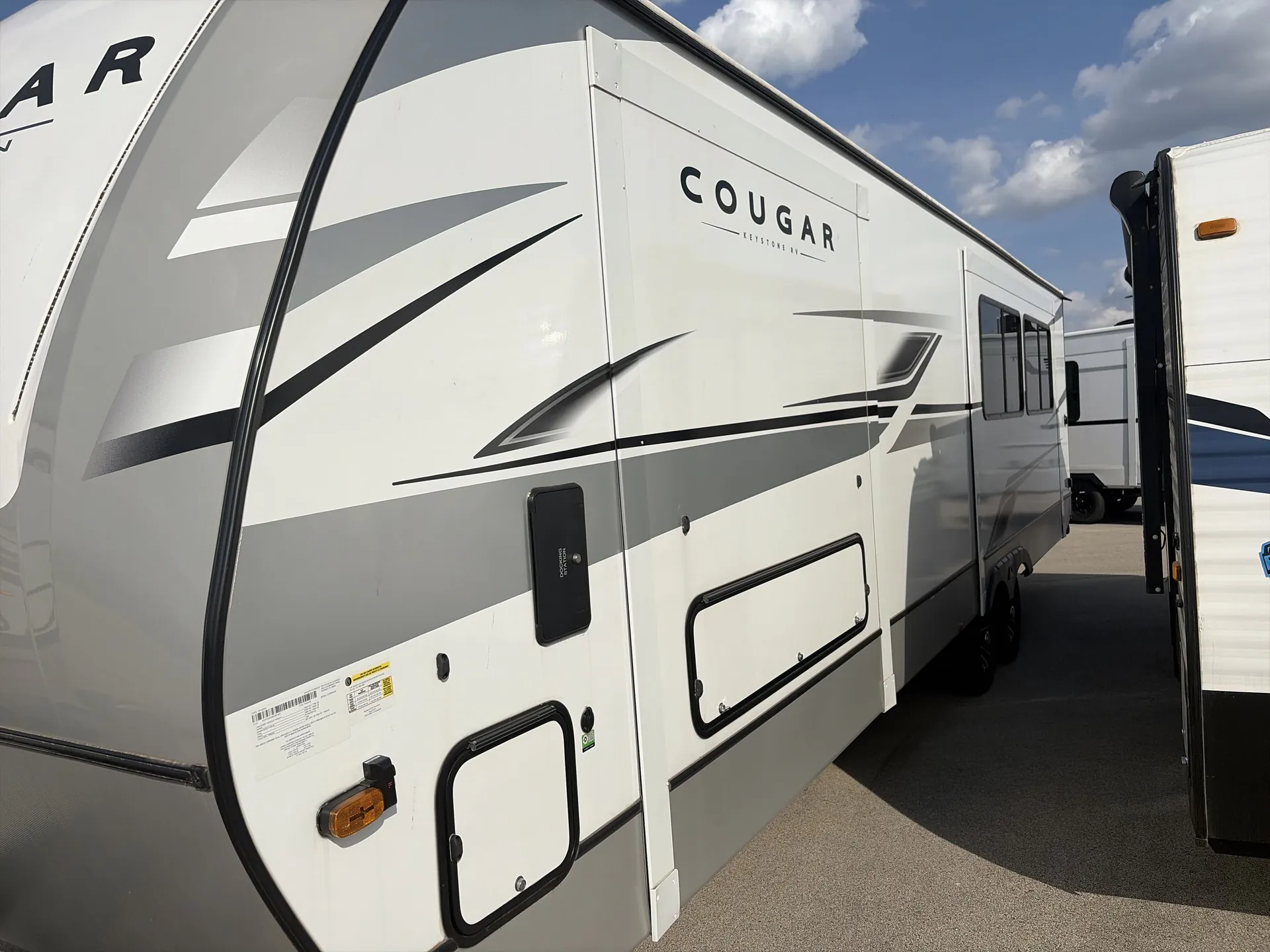 2025 Keystone Cougar Half-Ton East 30RKD — off campside