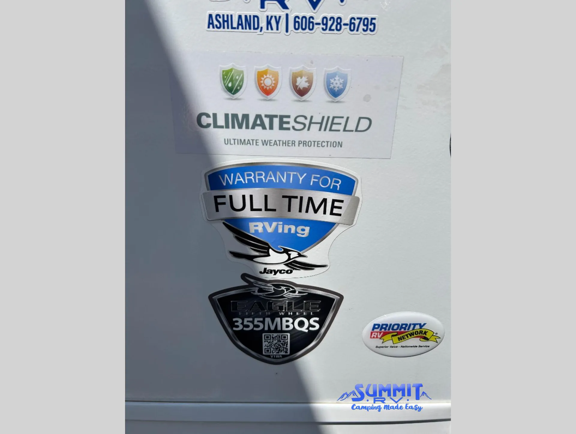 2027 Jayco Eagle 355MBQS — Photograph of exterior RV body graphics and model decals; no specific exterior feature category is supported