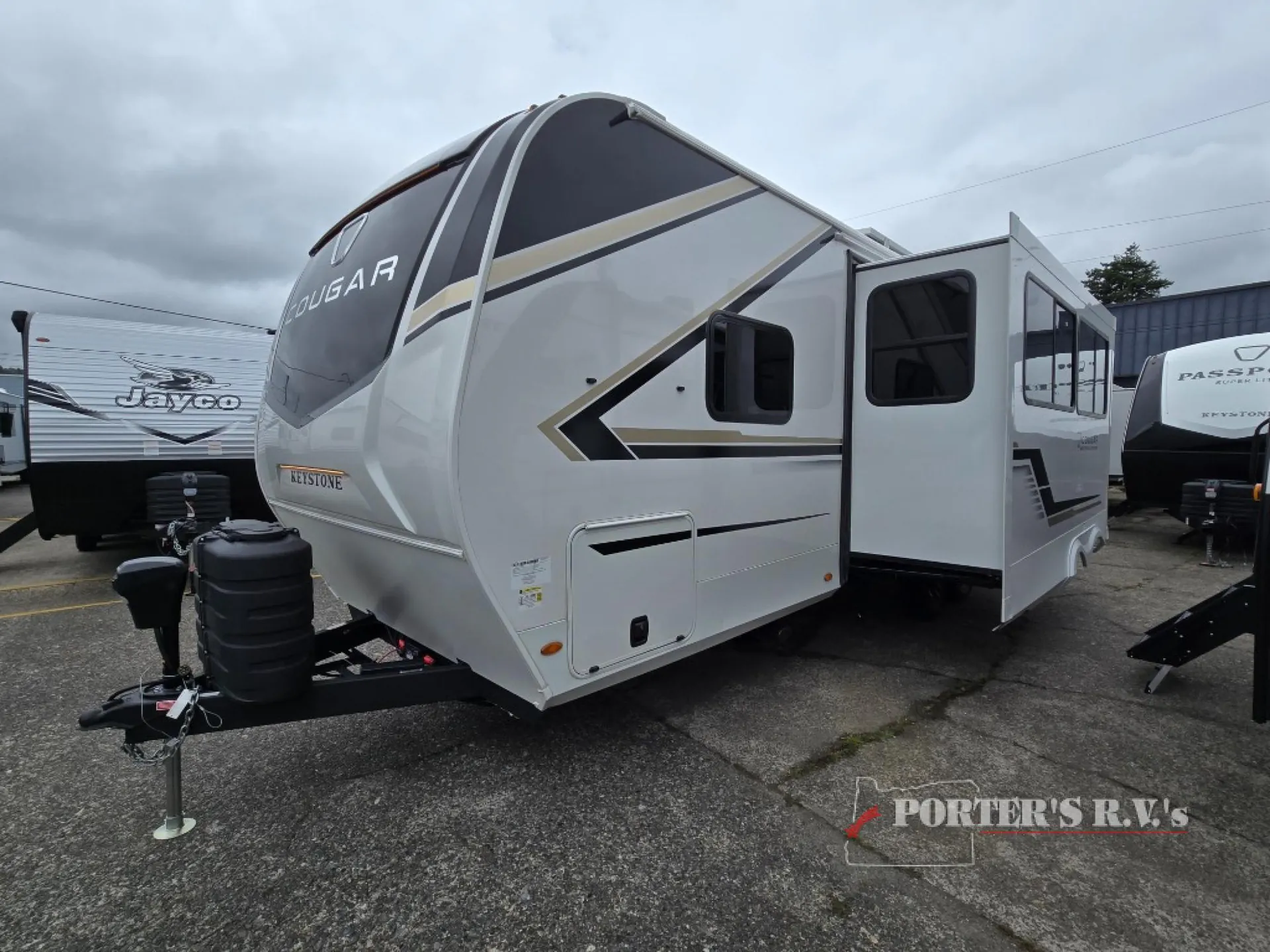 2027 Keystone Cougar Western 26LBWE dealer photo 1 from Porter's RV