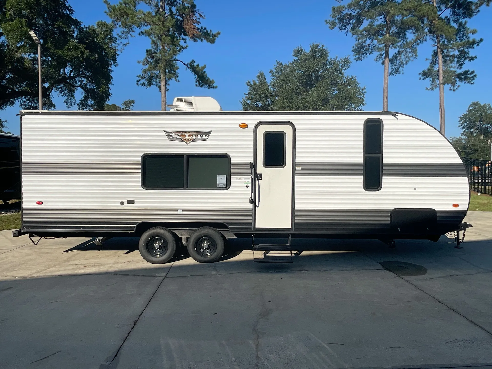 2023 Forest River Wildwood X-Lite 261BHXL — campside
