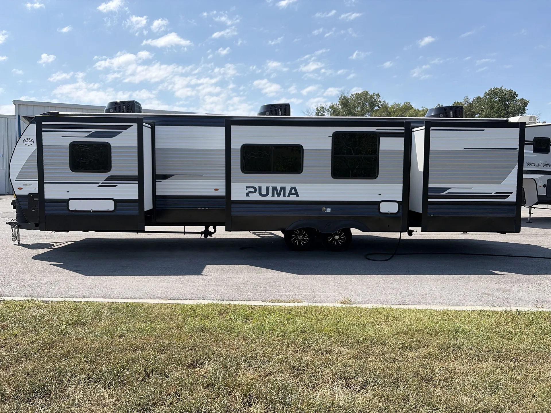 2027 Forest River Puma 32BHFS — off campside