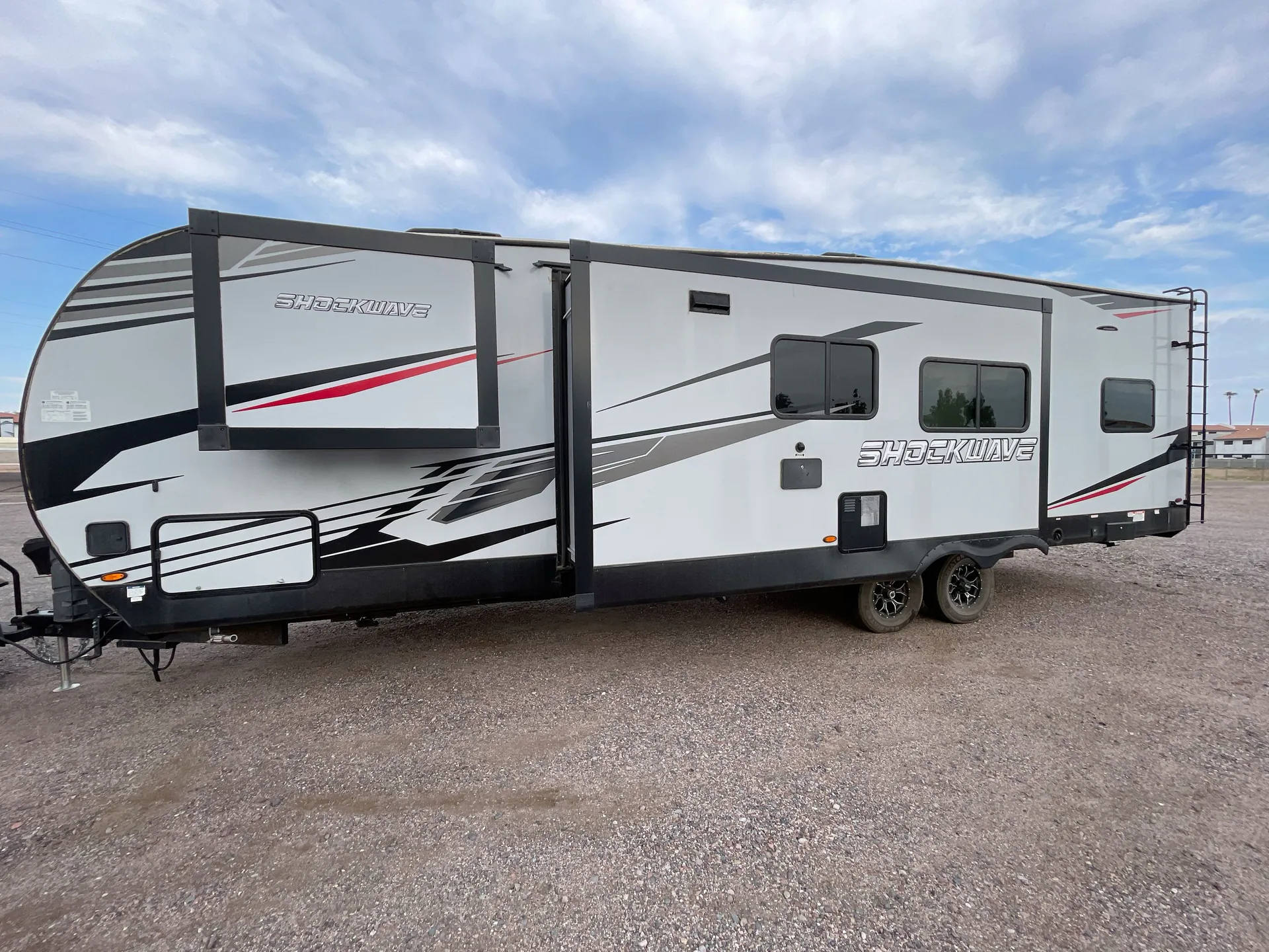 2022 Forest River Shockwave 31KSGDX — off campside