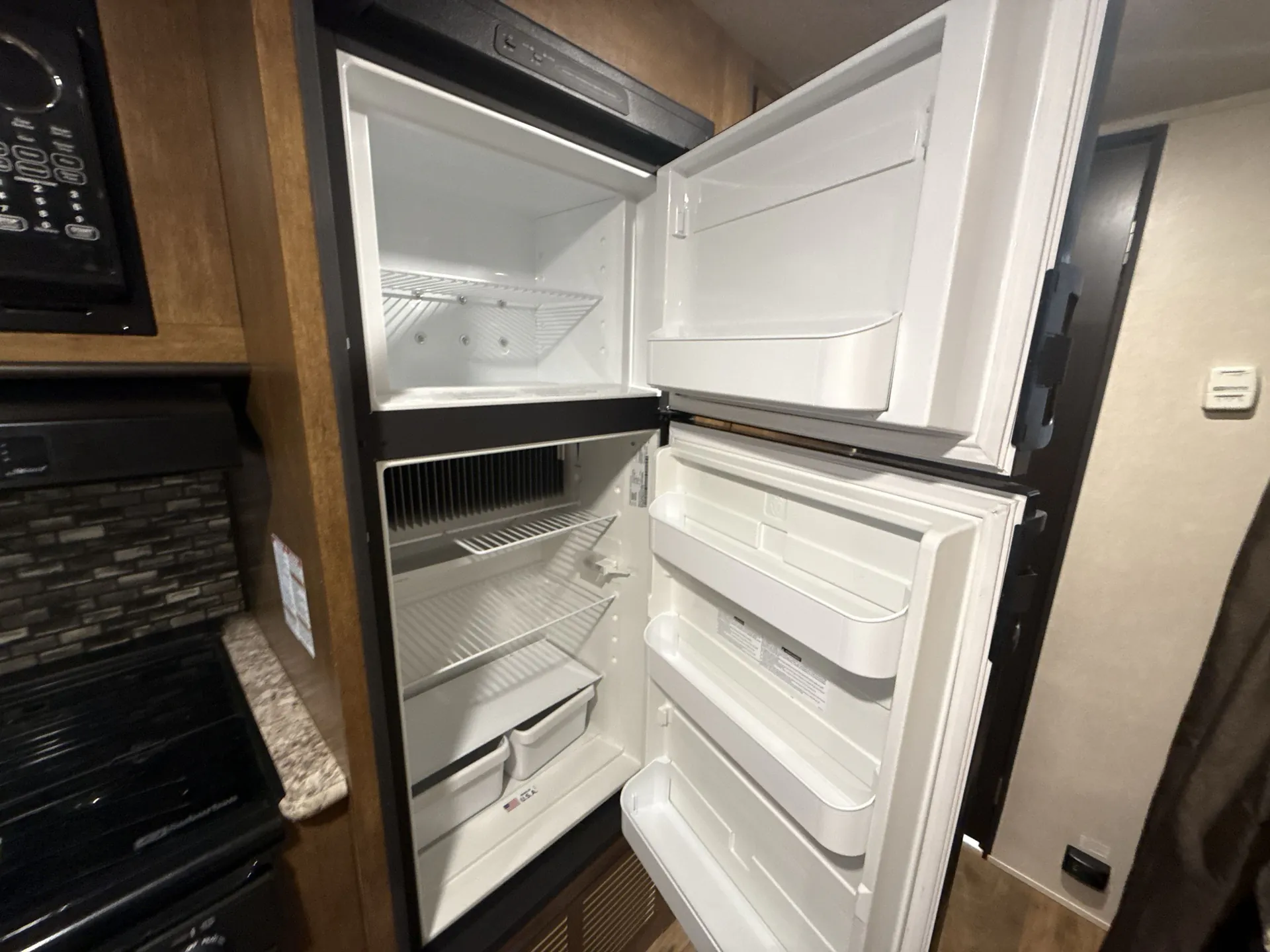2018 Forest River Wildwood X-Lite 230BHXL — fridge open