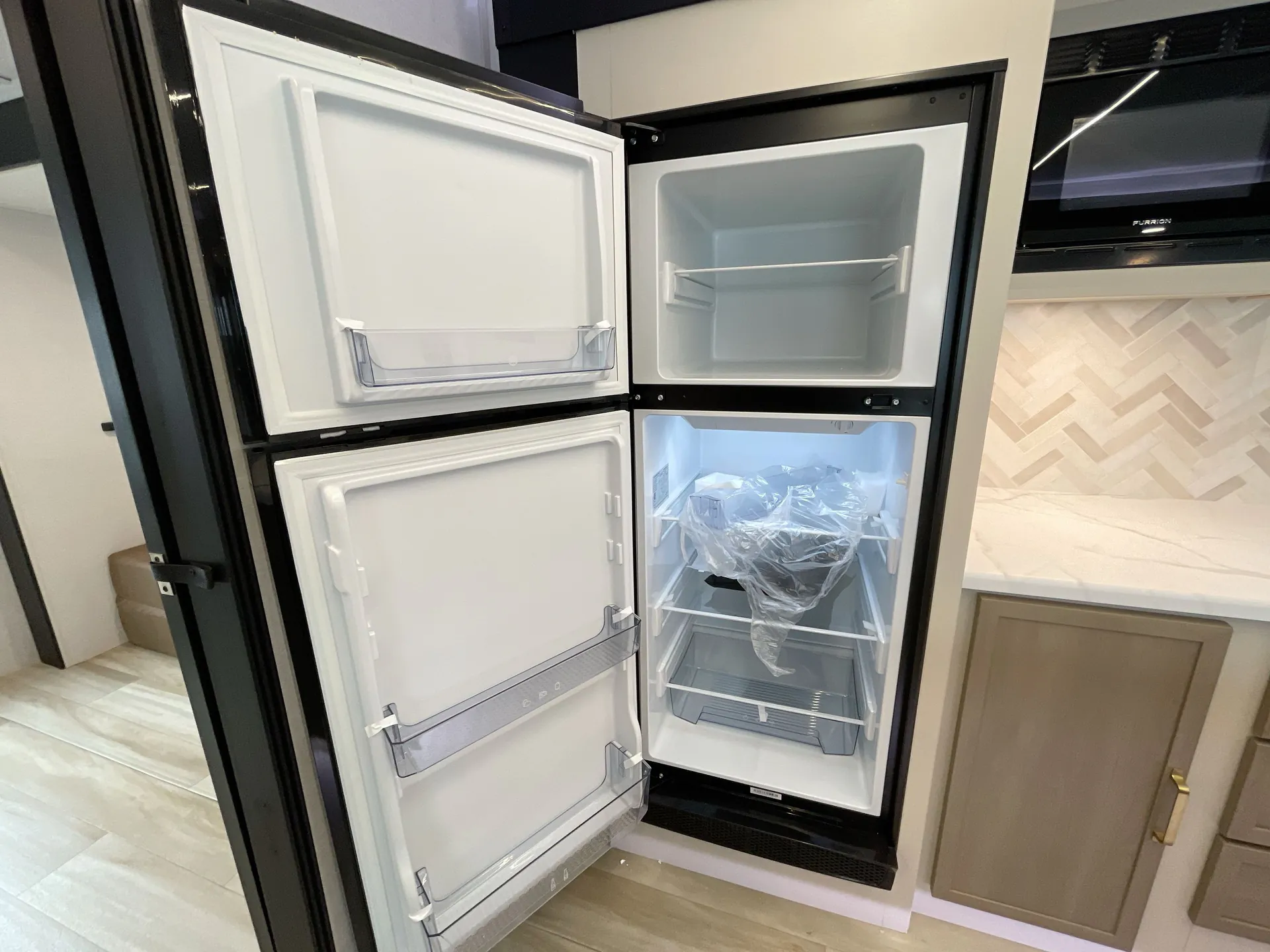2026 Forest River Salem Hemisphere 310BHI — fridge open