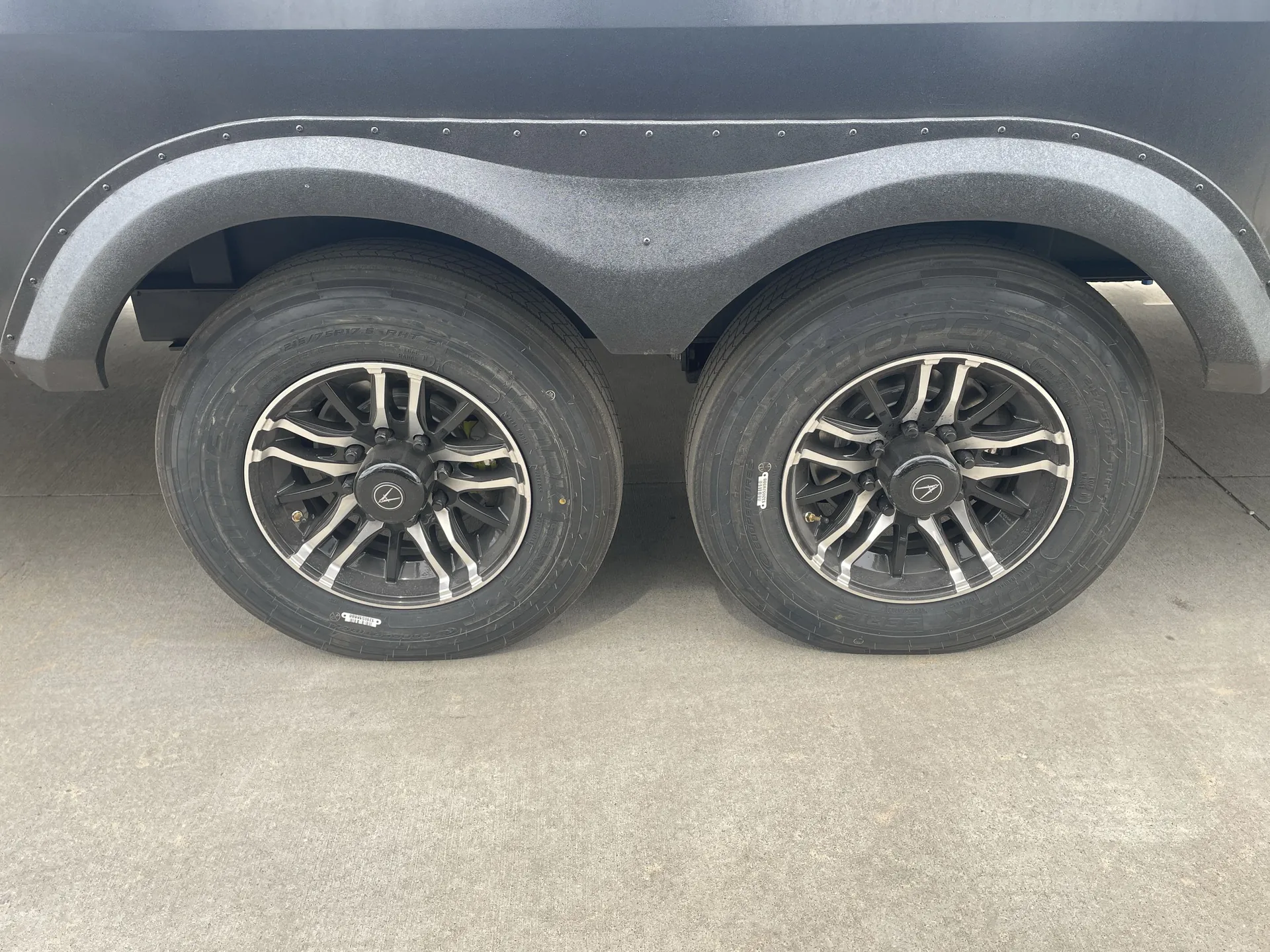2026 Grand Design Solitude 391DL — Exterior-installed dual wheels and wheel well are prominently shown