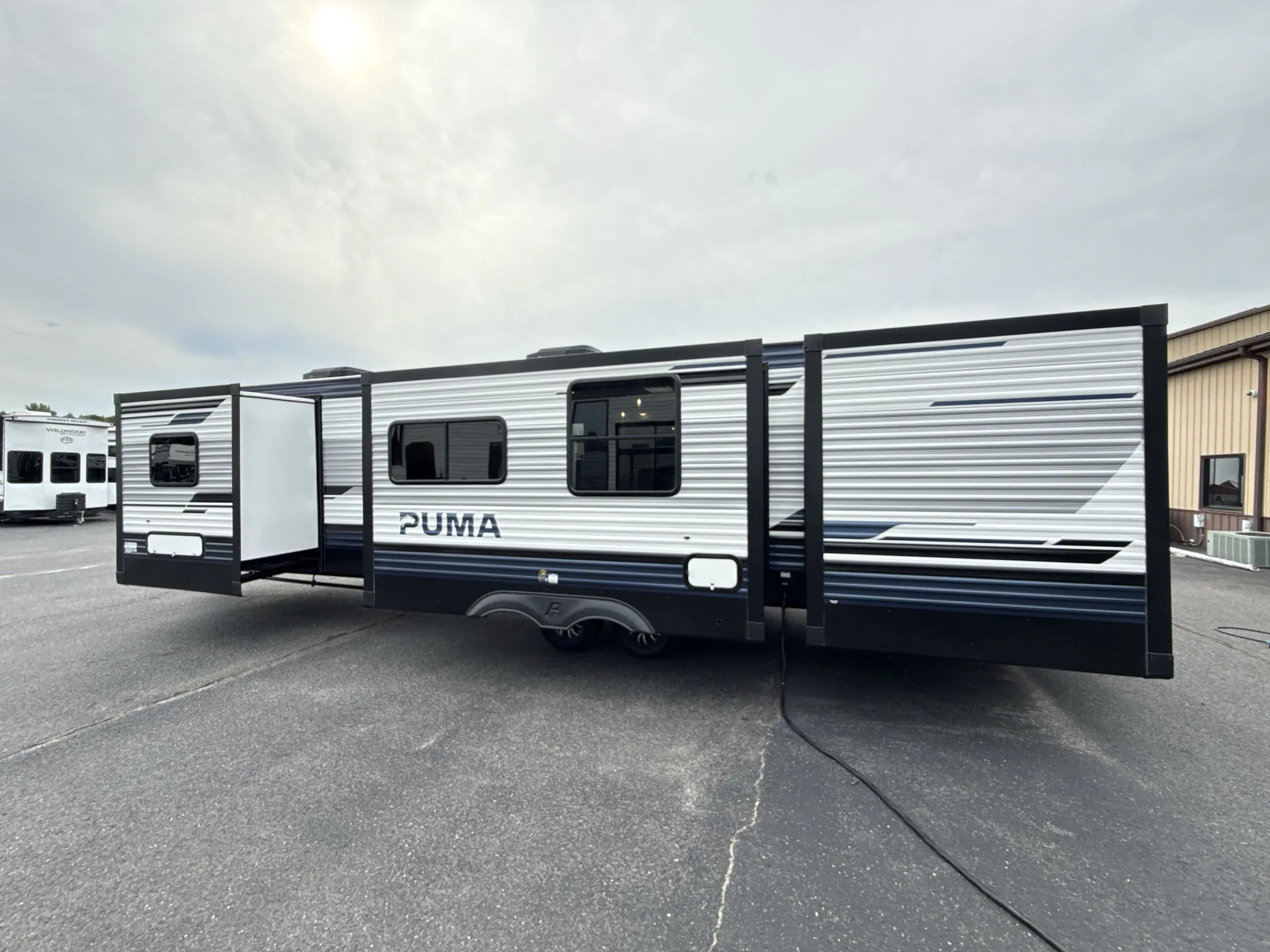2027 Forest River Puma 32BHFS — off campside