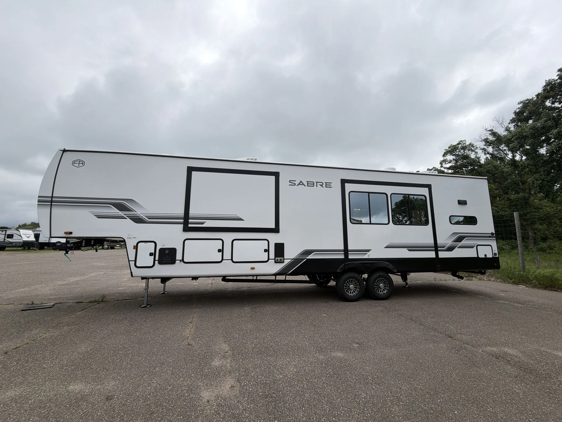 2027 Forest River Sabre 36EST — off campside
