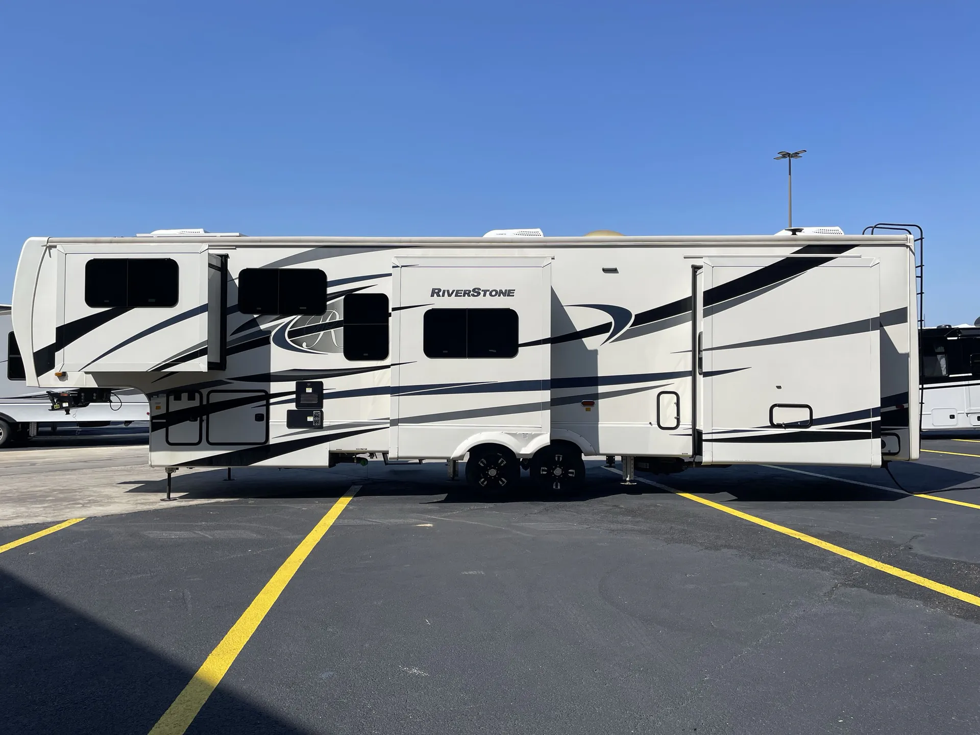 2023 Forest River RiverStone 391FSK — off campside