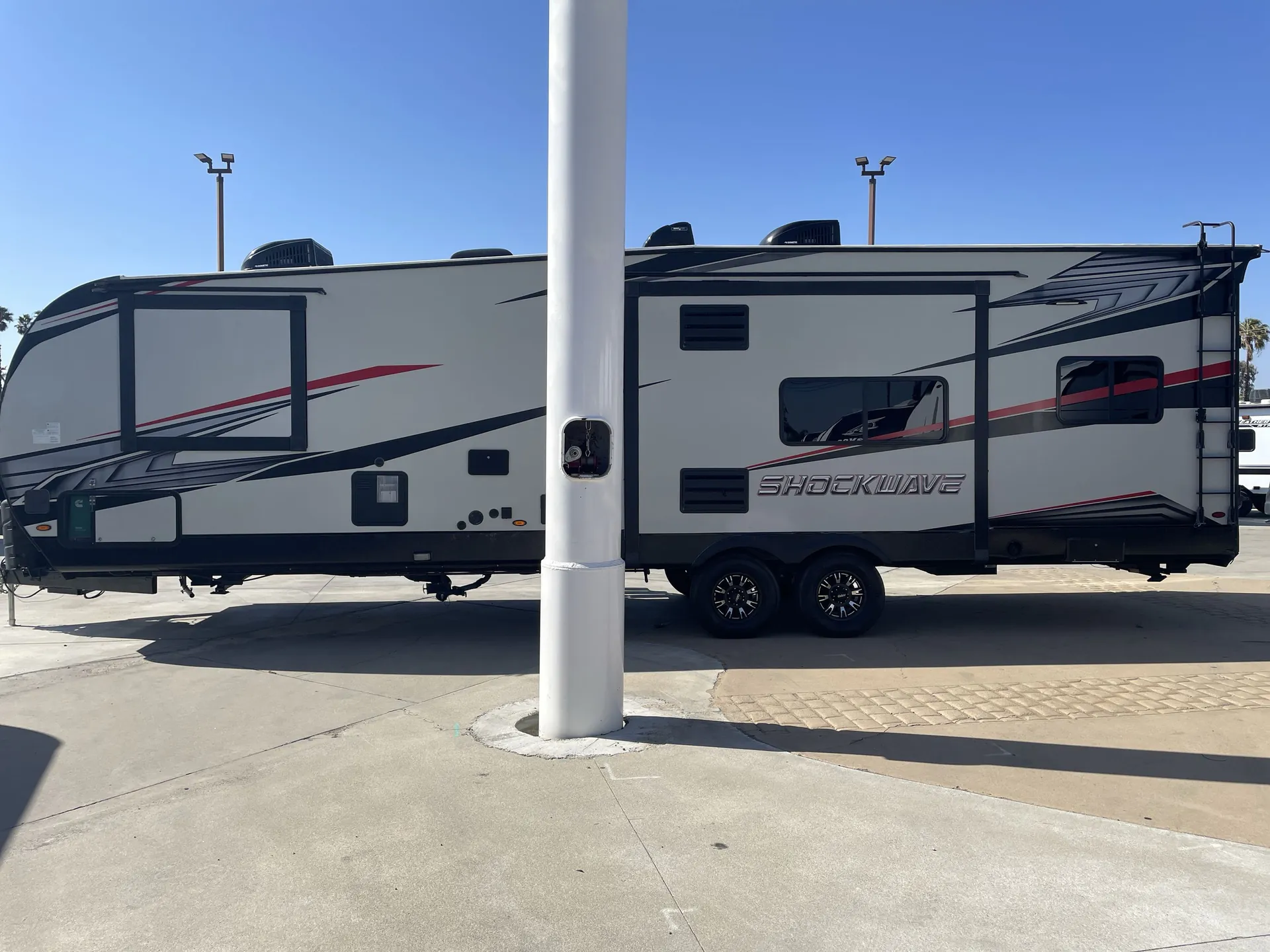 2020 Forest River Shockwave 31KSGDX — off campside