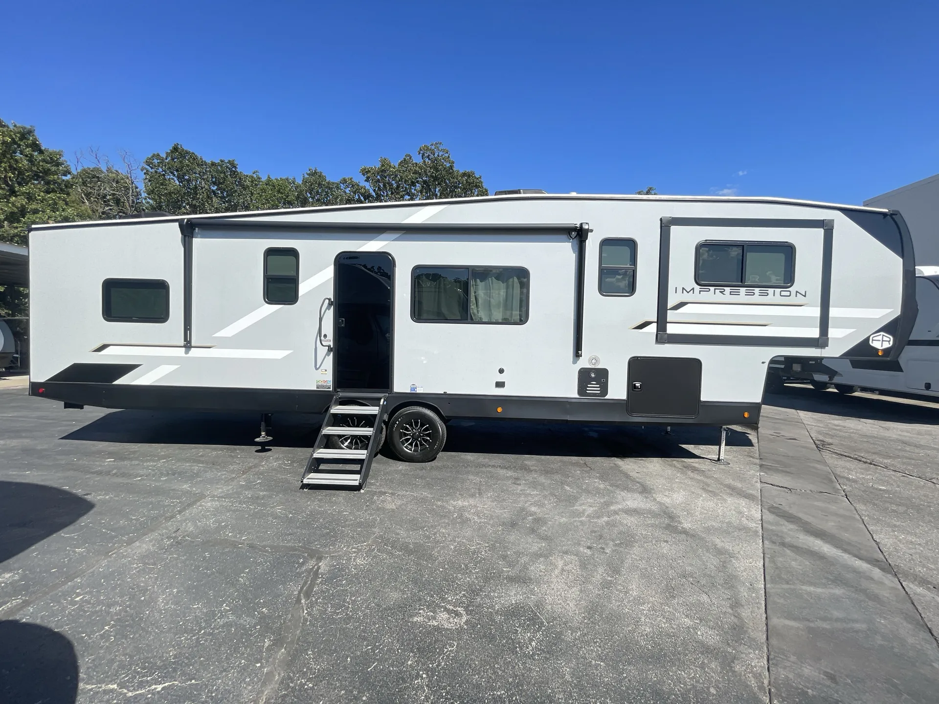 2025 Forest River Impression 320FL — off campside