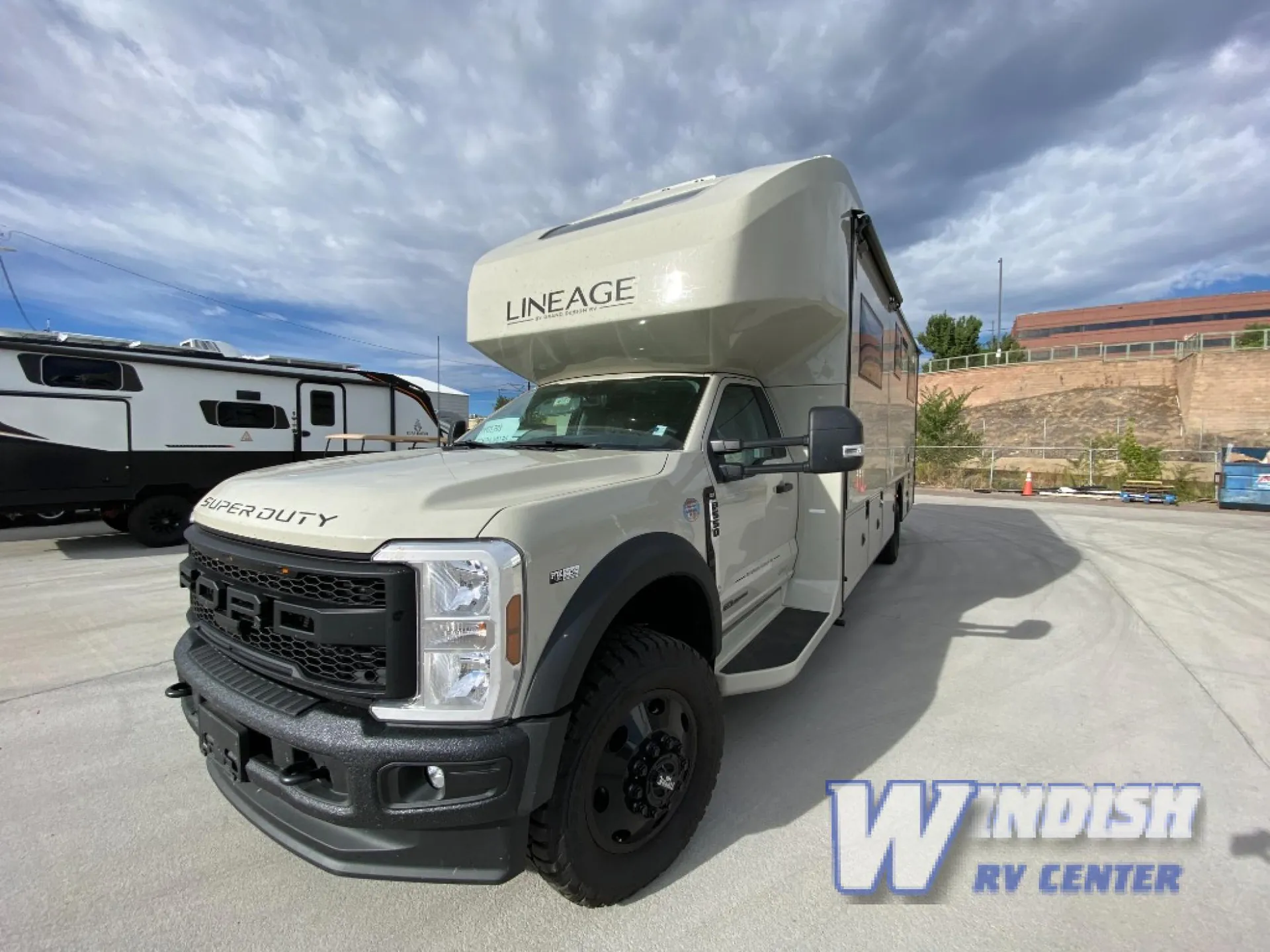 2027 Grand Design Lineage Series F 29AN5 — The front and side exterior of the Lineage motorhome