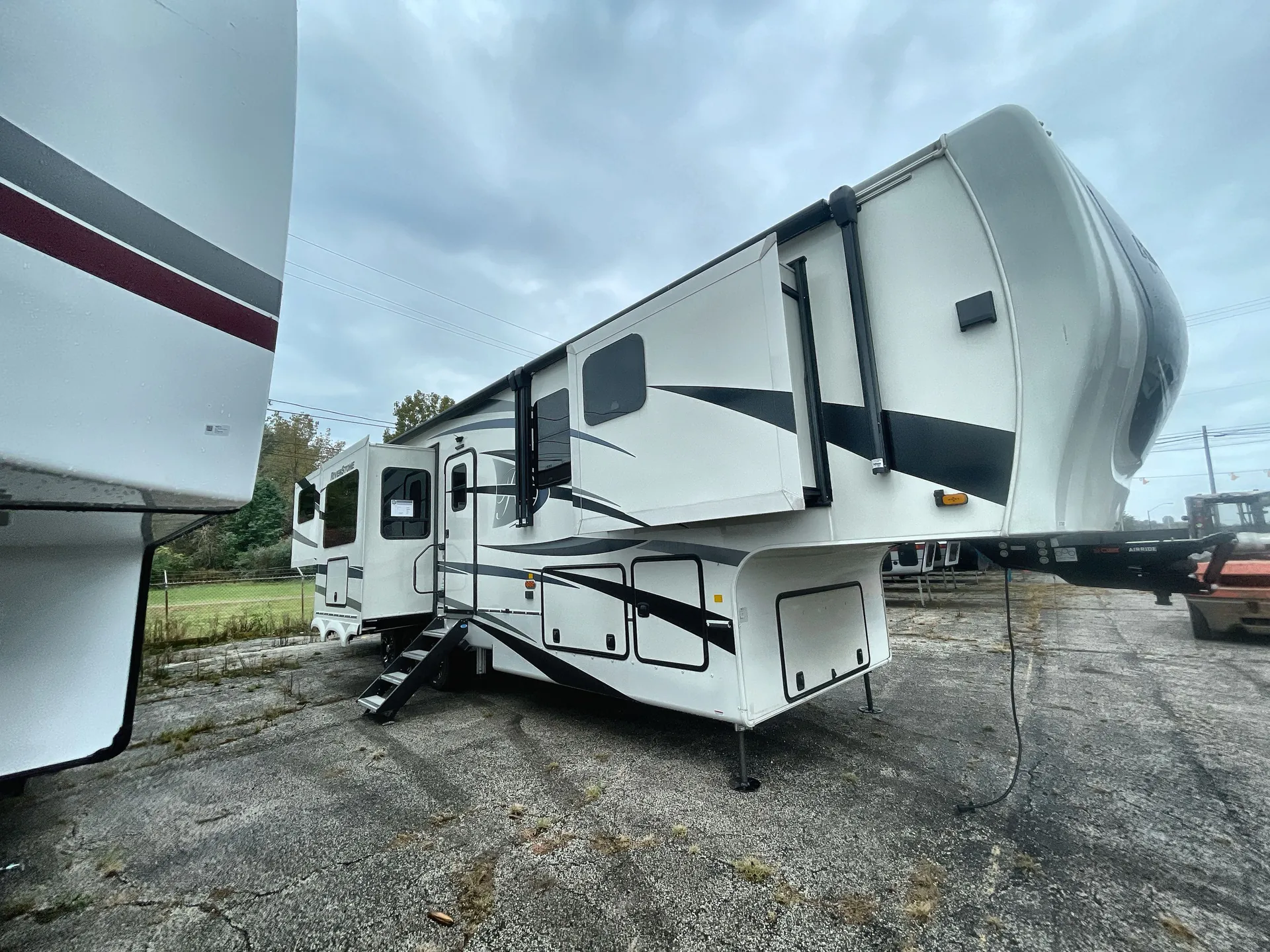 2023 Forest River RiverStone 419RD — campside