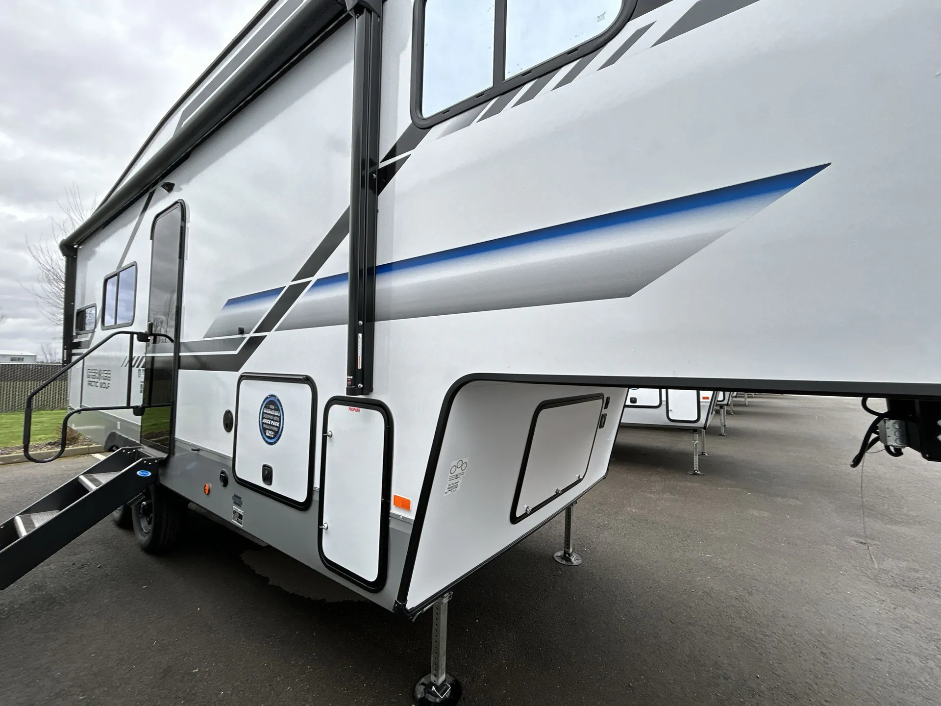 2025 Forest River Cherokee Arctic Wolf 23MLE — campside