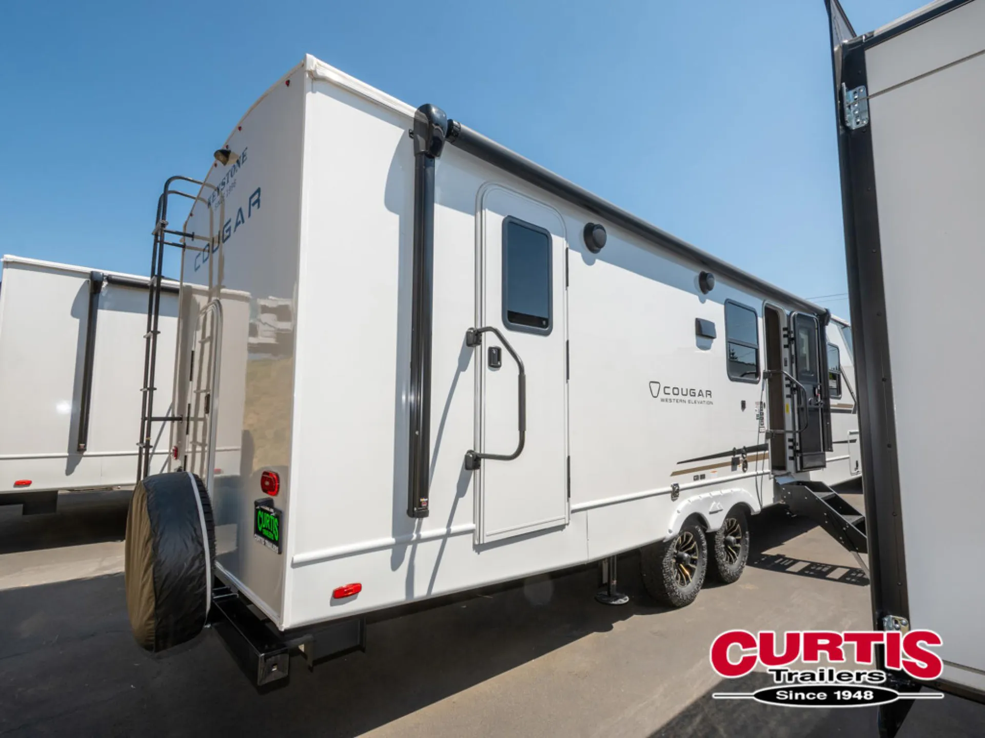 2026 Keystone Cougar Western Elevation 28BHWE dealer photo 2 from Curtis Trailers Inc Beaverton